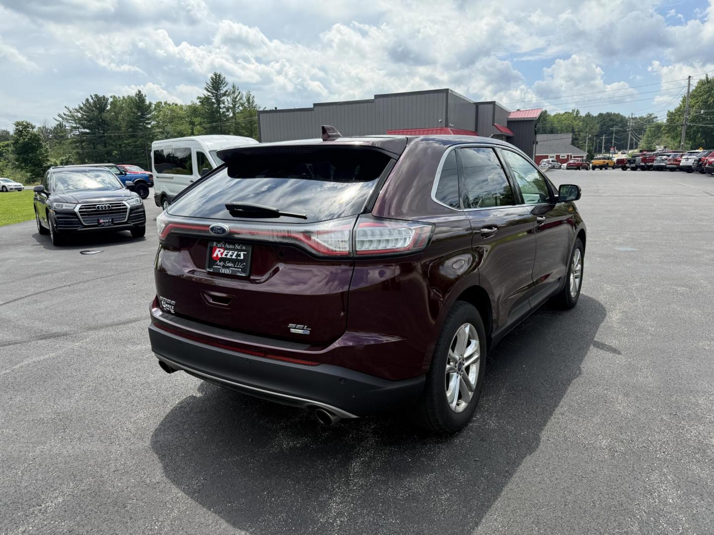2017 Burgundy /Black Ford Edge SEL AWD (2FMPK4J99HB) with an 2.0L L4 DOHC 16V engine, 6A transmission, located at 11115 Chardon Rd. , Chardon, OH, 44024, (440) 214-9705, 41.580246, -81.241943 - This 2017 Ford Edge SEL AWD is a midsize SUV featuring a turbocharged 2.0L EcoBoost I4 engine and a 6-speed automatic transmission, achieving up to 27 MPG on the highway. It offers a premium leather interior with heated front seats, a power panoramic moonroof, an 8-inch touchscreen with navigation, - Photo#7