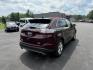 2017 Burgundy /Black Ford Edge SEL AWD (2FMPK4J99HB) with an 2.0L L4 DOHC 16V engine, 6A transmission, located at 11115 Chardon Rd. , Chardon, OH, 44024, (440) 214-9705, 41.580246, -81.241943 - This 2017 Ford Edge SEL AWD is a midsize SUV featuring a turbocharged 2.0L EcoBoost I4 engine and a 6-speed automatic transmission, achieving up to 27 MPG on the highway. It offers a premium leather interior with heated front seats, a power panoramic moonroof, an 8-inch touchscreen with navigation, - Photo#7