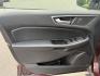 2017 Burgundy /Black Ford Edge SEL AWD (2FMPK4J99HB) with an 2.0L L4 DOHC 16V engine, 6A transmission, located at 11115 Chardon Rd. , Chardon, OH, 44024, (440) 214-9705, 41.580246, -81.241943 - This 2017 Ford Edge SEL AWD is a midsize SUV featuring a turbocharged 2.0L EcoBoost I4 engine and a 6-speed automatic transmission, achieving up to 27 MPG on the highway. It offers a premium leather interior with heated front seats, a power panoramic moonroof, an 8-inch touchscreen with navigation, - Photo#16