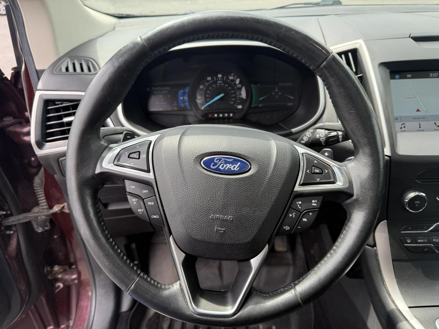 2017 Burgundy /Black Ford Edge SEL AWD (2FMPK4J99HB) with an 2.0L L4 DOHC 16V engine, 6A transmission, located at 11115 Chardon Rd. , Chardon, OH, 44024, (440) 214-9705, 41.580246, -81.241943 - This 2017 Ford Edge SEL AWD is a midsize SUV featuring a turbocharged 2.0L EcoBoost I4 engine and a 6-speed automatic transmission, achieving up to 27 MPG on the highway. It offers a premium leather interior with heated front seats, a power panoramic moonroof, an 8-inch touchscreen with navigation, - Photo#22