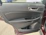 2017 Burgundy /Black Ford Edge SEL AWD (2FMPK4J99HB) with an 2.0L L4 DOHC 16V engine, 6A transmission, located at 11115 Chardon Rd. , Chardon, OH, 44024, (440) 214-9705, 41.580246, -81.241943 - This 2017 Ford Edge SEL AWD is a midsize SUV featuring a turbocharged 2.0L EcoBoost I4 engine and a 6-speed automatic transmission, achieving up to 27 MPG on the highway. It offers a premium leather interior with heated front seats, a power panoramic moonroof, an 8-inch touchscreen with navigation, - Photo#34