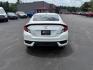 2017 White /Gray Honda Civic Touring Coupe CVT (2HGFC3B99HH) with an 1.5L I4 DOHC 16V Turbo engine, Automatic transmission, located at 11115 Chardon Rd. , Chardon, OH, 44024, (440) 214-9705, 41.580246, -81.241943 - FRESH TRADE ALERT ---- This 2017 Honda Civic Touring Coupe features a turbocharged 1.5L I4 engine, achieving an impressive 40 MPG highway, and comes equipped with a leather interior, heated front seats, dual-zone automatic climate control, and a 7-inch touchscreen supporting Apple CarPlay and Androi - Photo#8