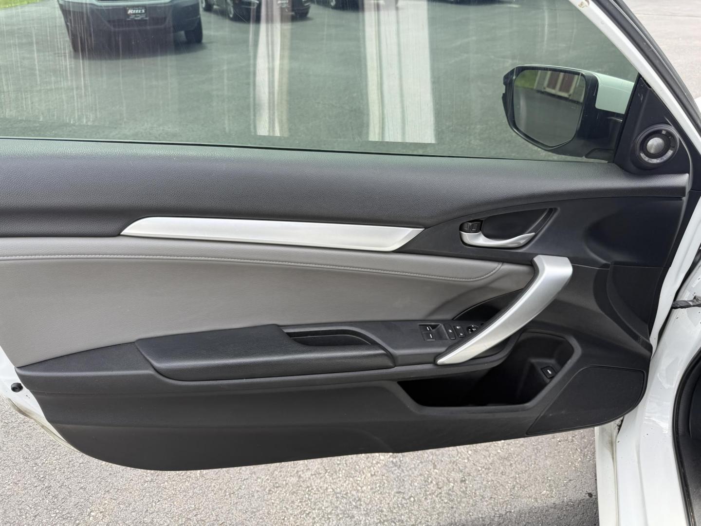 2017 White /Gray Honda Civic Touring Coupe CVT (2HGFC3B99HH) with an 1.5L I4 DOHC 16V Turbo engine, Automatic transmission, located at 11115 Chardon Rd. , Chardon, OH, 44024, (440) 214-9705, 41.580246, -81.241943 - FRESH TRADE ALERT ---- This 2017 Honda Civic Touring Coupe features a turbocharged 1.5L I4 engine, achieving an impressive 40 MPG highway, and comes equipped with a leather interior, heated front seats, dual-zone automatic climate control, and a 7-inch touchscreen supporting Apple CarPlay and Androi - Photo#13