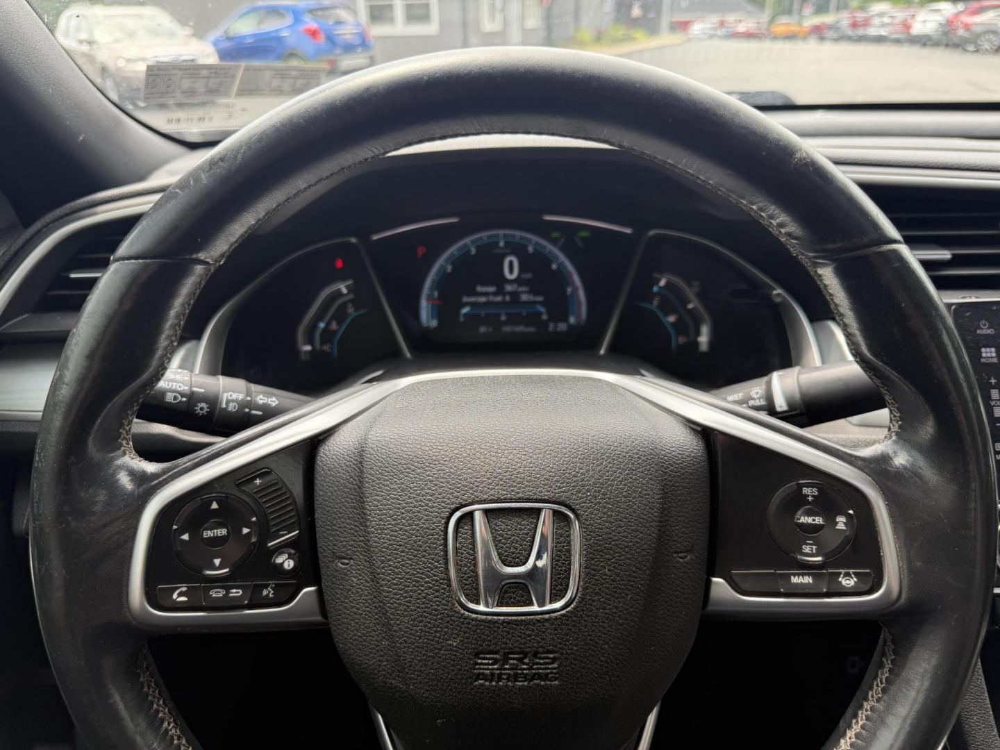 2017 White /Gray Honda Civic Touring Coupe CVT (2HGFC3B99HH) with an 1.5L I4 DOHC 16V Turbo engine, Automatic transmission, located at 11115 Chardon Rd. , Chardon, OH, 44024, (440) 214-9705, 41.580246, -81.241943 - FRESH TRADE ALERT ---- This 2017 Honda Civic Touring Coupe features a turbocharged 1.5L I4 engine, achieving an impressive 40 MPG highway, and comes equipped with a leather interior, heated front seats, dual-zone automatic climate control, and a 7-inch touchscreen supporting Apple CarPlay and Androi - Photo#18