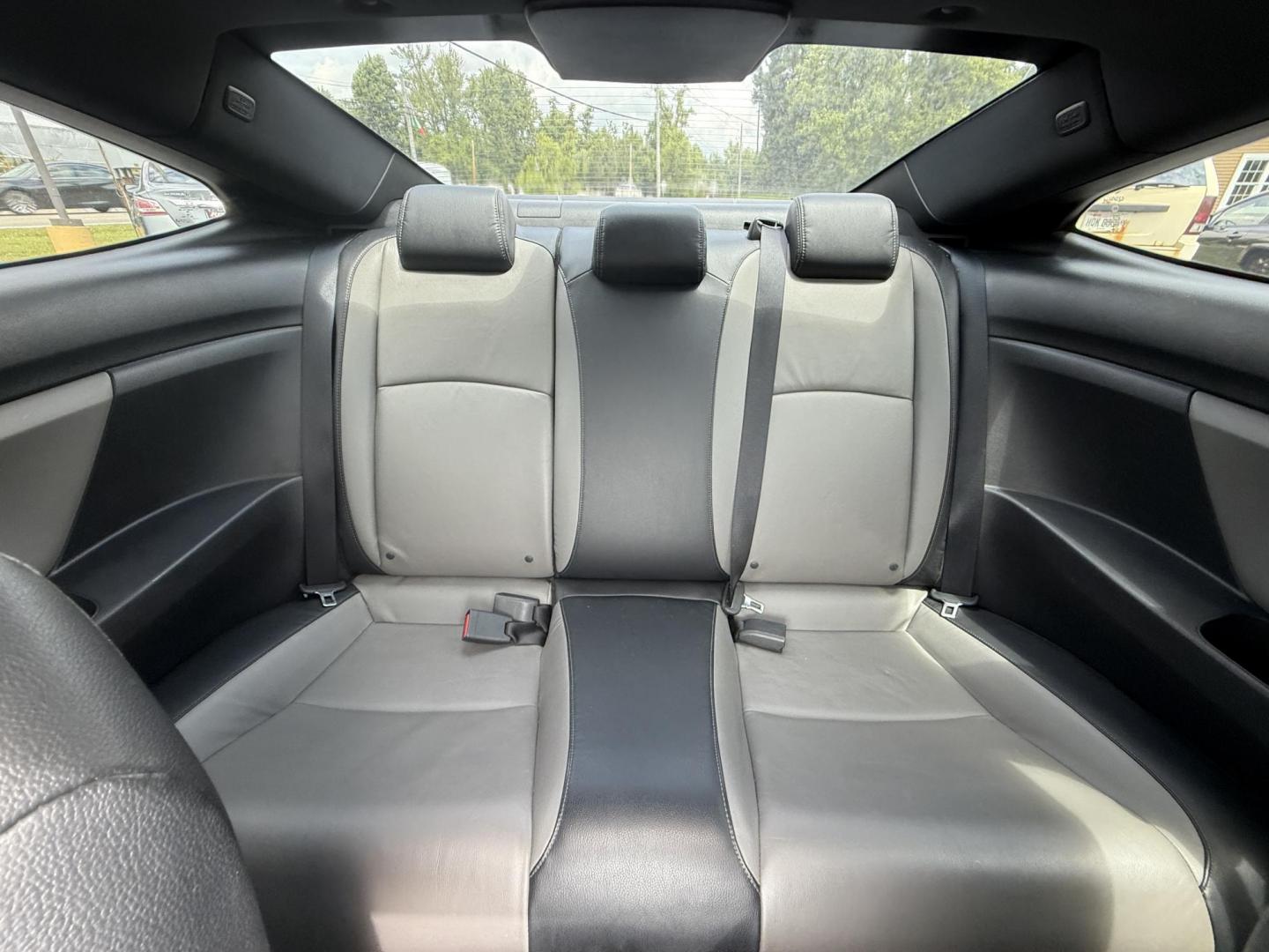 2017 White /Gray Honda Civic Touring Coupe CVT (2HGFC3B99HH) with an 1.5L I4 DOHC 16V Turbo engine, Automatic transmission, located at 11115 Chardon Rd. , Chardon, OH, 44024, (440) 214-9705, 41.580246, -81.241943 - FRESH TRADE ALERT ---- This 2017 Honda Civic Touring Coupe features a turbocharged 1.5L I4 engine, achieving an impressive 40 MPG highway, and comes equipped with a leather interior, heated front seats, dual-zone automatic climate control, and a 7-inch touchscreen supporting Apple CarPlay and Androi - Photo#27