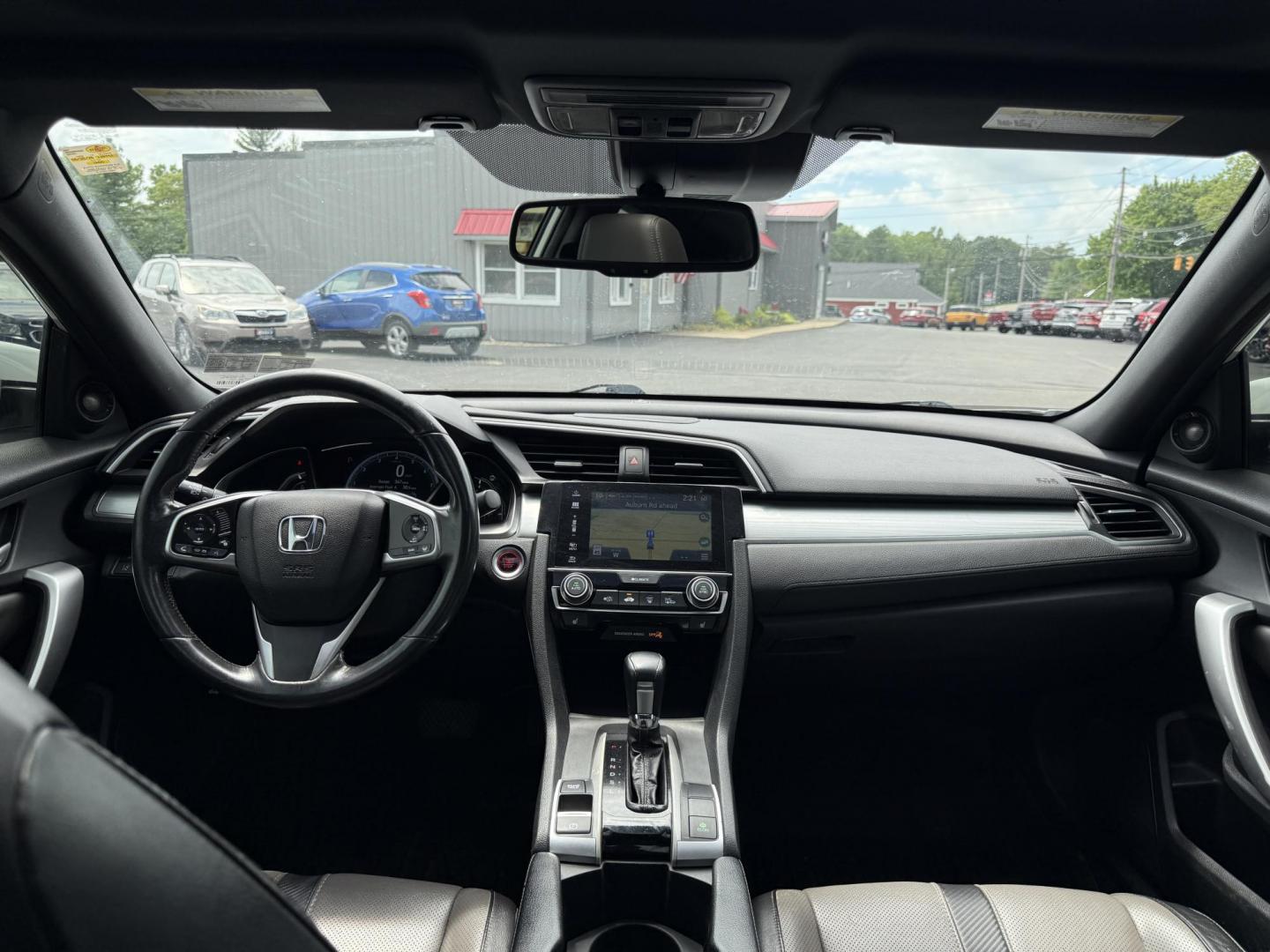 2017 White /Gray Honda Civic Touring Coupe CVT (2HGFC3B99HH) with an 1.5L I4 DOHC 16V Turbo engine, Automatic transmission, located at 11115 Chardon Rd. , Chardon, OH, 44024, (440) 214-9705, 41.580246, -81.241943 - FRESH TRADE ALERT ---- This 2017 Honda Civic Touring Coupe features a turbocharged 1.5L I4 engine, achieving an impressive 40 MPG highway, and comes equipped with a leather interior, heated front seats, dual-zone automatic climate control, and a 7-inch touchscreen supporting Apple CarPlay and Androi - Photo#28