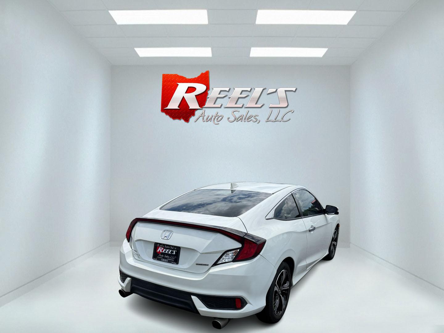 2017 White /Gray Honda Civic Touring Coupe CVT (2HGFC3B99HH) with an 1.5L I4 DOHC 16V Turbo engine, Automatic transmission, located at 11115 Chardon Rd. , Chardon, OH, 44024, (440) 214-9705, 41.580246, -81.241943 - FRESH TRADE ALERT ---- This 2017 Honda Civic Touring Coupe features a turbocharged 1.5L I4 engine, achieving an impressive 40 MPG highway, and comes equipped with a leather interior, heated front seats, dual-zone automatic climate control, and a 7-inch touchscreen supporting Apple CarPlay and Androi - Photo#28