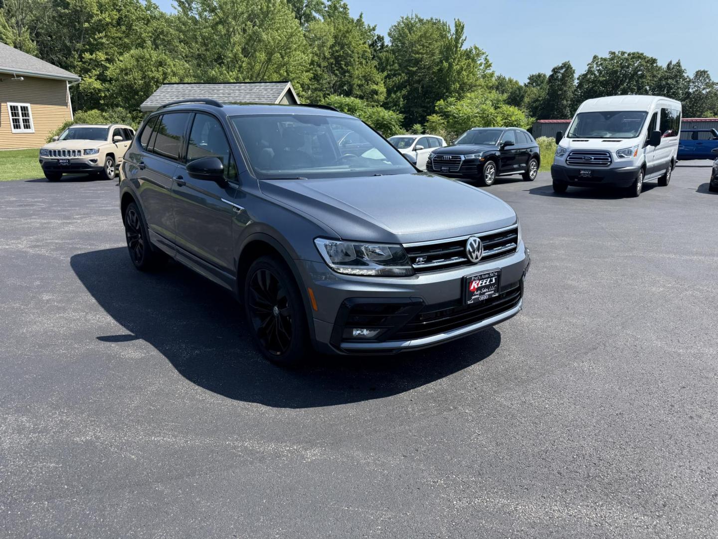 2021 Gray /Black Volkswagen Tiguan SE 4Motion AWD (3VV2B7AX7MM) with an 2.0L I4 DOHC 16V TURBO engine, 8A transmission, located at 11115 Chardon Rd. , Chardon, OH, 44024, (440) 214-9705, 41.580246, -81.241943 - Photo#2
