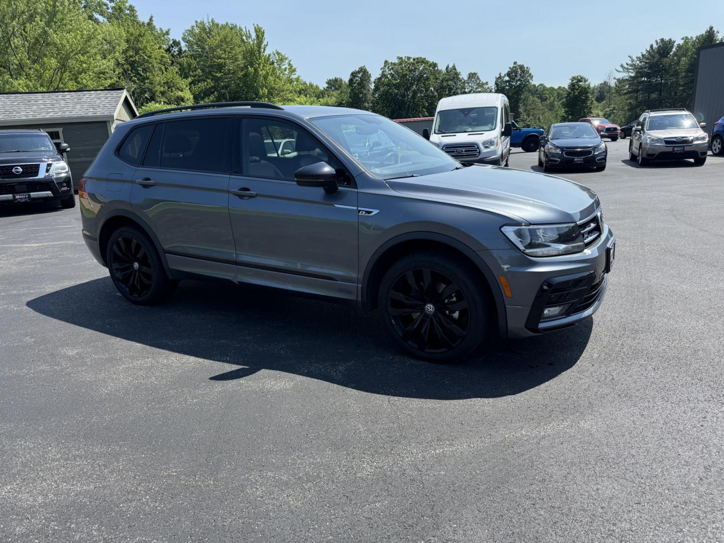 2021 Gray /Black Volkswagen Tiguan SE 4Motion AWD (3VV2B7AX7MM) with an 2.0L I4 DOHC 16V TURBO engine, 8A transmission, located at 11115 Chardon Rd. , Chardon, OH, 44024, (440) 214-9705, 41.580246, -81.241943 - Photo#3