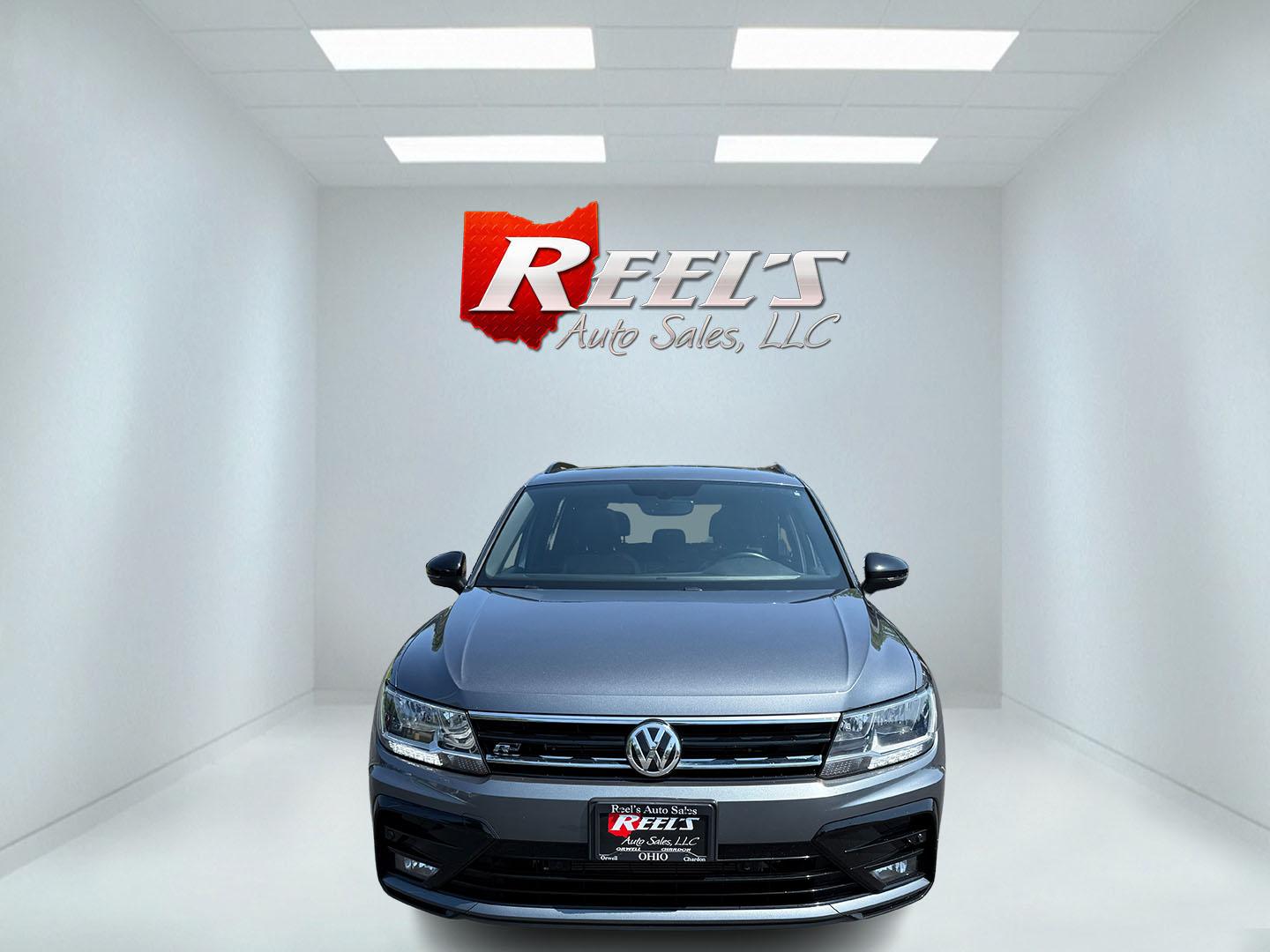 2021 Gray /Black Volkswagen Tiguan SE 4Motion AWD (3VV2B7AX7MM) with an 2.0L I4 DOHC 16V TURBO engine, 8A transmission, located at 11115 Chardon Rd. , Chardon, OH, 44024, (440) 214-9705, 41.580246, -81.241943 - This One Owner 2021 Volkswagen Tiguan SE R-Line AWD features a 2.0L turbocharged I4 engine paired with an 8-speed automatic transmission and Volkswagen’s 4Motion all-wheel-drive system with selectable terrain modes, providing enhanced traction and versatility. It offers a suite of premium features - Photo#1