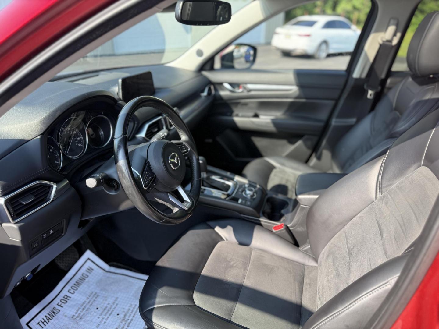 2018 Red /Black Mazda CX-5 Touring AWD (JM3KFBCM9J0) with an 2.5L I4 DOHC 16V engine, 6 Speed Automatic transmission, located at 547 E. Main St., Orwell, OH, 44076, (440) 437-5893, 41.535435, -80.847855 - This 2018 Mazda CX-5 Touring AWD with a 2.5L I4 engine and 6-speed automatic transmission offers a well-rounded package, delivering up to 30 MPG on the highway. It comes equipped with advanced safety features like Blind Spot Monitoring, Rear Cross Traffic Alert, and Adaptive Cruise Control, enhancin - Photo#7