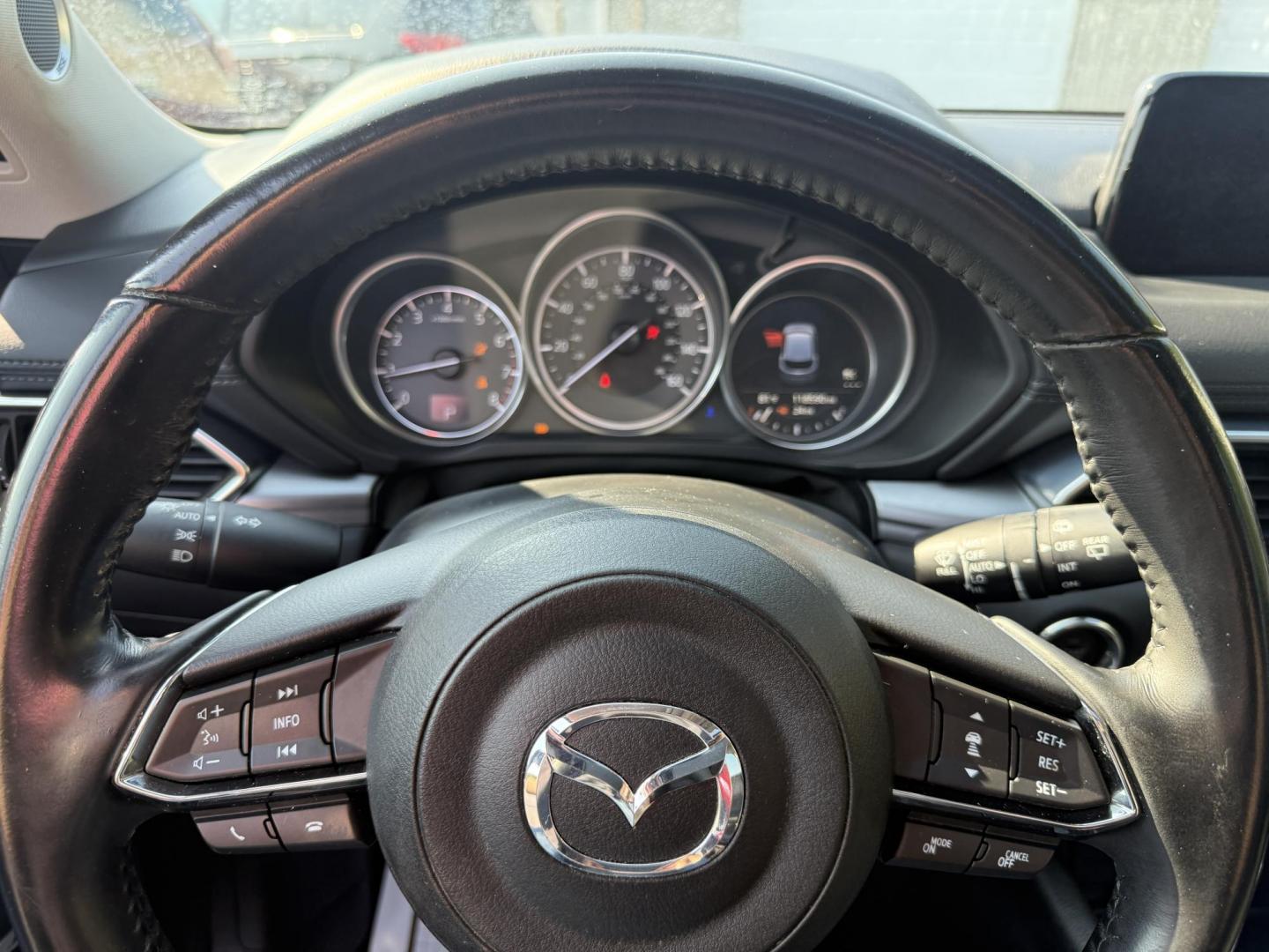 2018 Red /Black Mazda CX-5 Touring AWD (JM3KFBCM9J0) with an 2.5L I4 DOHC 16V engine, 6 Speed Automatic transmission, located at 547 E. Main St., Orwell, OH, 44076, (440) 437-5893, 41.535435, -80.847855 - This 2018 Mazda CX-5 Touring AWD with a 2.5L I4 engine and 6-speed automatic transmission offers a well-rounded package, delivering up to 30 MPG on the highway. It comes equipped with advanced safety features like Blind Spot Monitoring, Rear Cross Traffic Alert, and Adaptive Cruise Control, enhancin - Photo#15