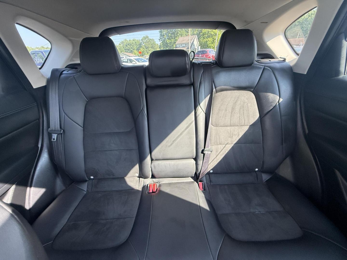 2018 Red /Black Mazda CX-5 Touring AWD (JM3KFBCM9J0) with an 2.5L I4 DOHC 16V engine, 6 Speed Automatic transmission, located at 547 E. Main St., Orwell, OH, 44076, (440) 437-5893, 41.535435, -80.847855 - This 2018 Mazda CX-5 Touring AWD with a 2.5L I4 engine and 6-speed automatic transmission offers a well-rounded package, delivering up to 30 MPG on the highway. It comes equipped with advanced safety features like Blind Spot Monitoring, Rear Cross Traffic Alert, and Adaptive Cruise Control, enhancin - Photo#24