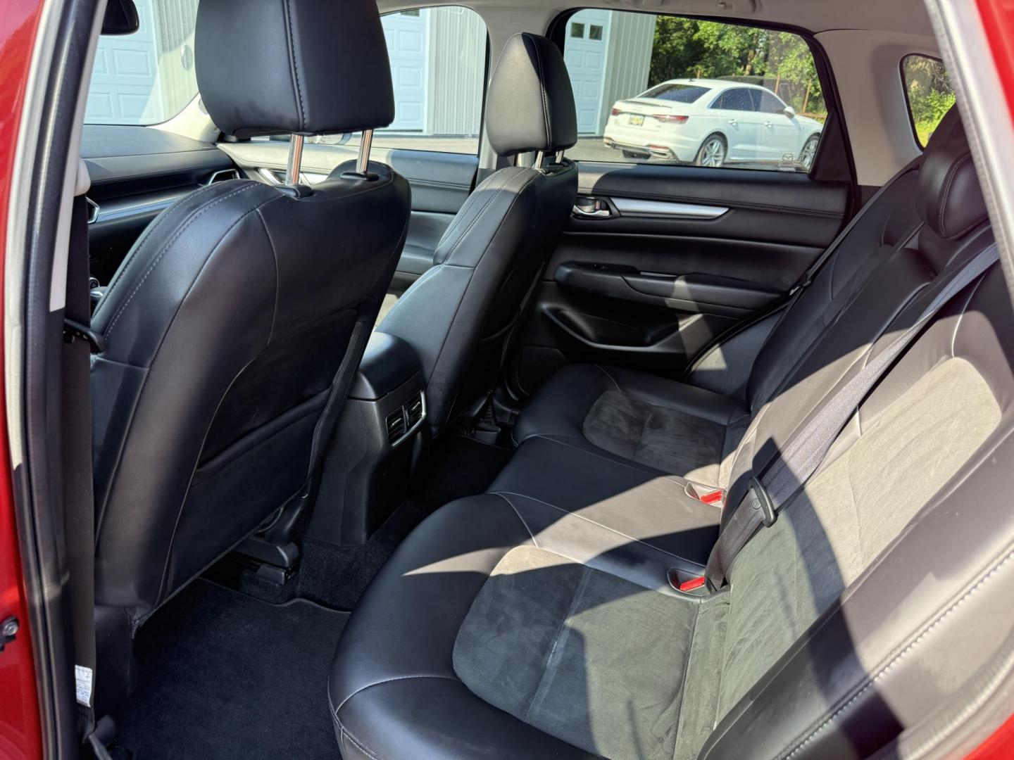 2018 Red /Black Mazda CX-5 Touring AWD (JM3KFBCM9J0) with an 2.5L I4 DOHC 16V engine, 6 Speed Automatic transmission, located at 547 E. Main St., Orwell, OH, 44076, (440) 437-5893, 41.535435, -80.847855 - This 2018 Mazda CX-5 Touring AWD with a 2.5L I4 engine and 6-speed automatic transmission offers a well-rounded package, delivering up to 30 MPG on the highway. It comes equipped with advanced safety features like Blind Spot Monitoring, Rear Cross Traffic Alert, and Adaptive Cruise Control, enhancin - Photo#25