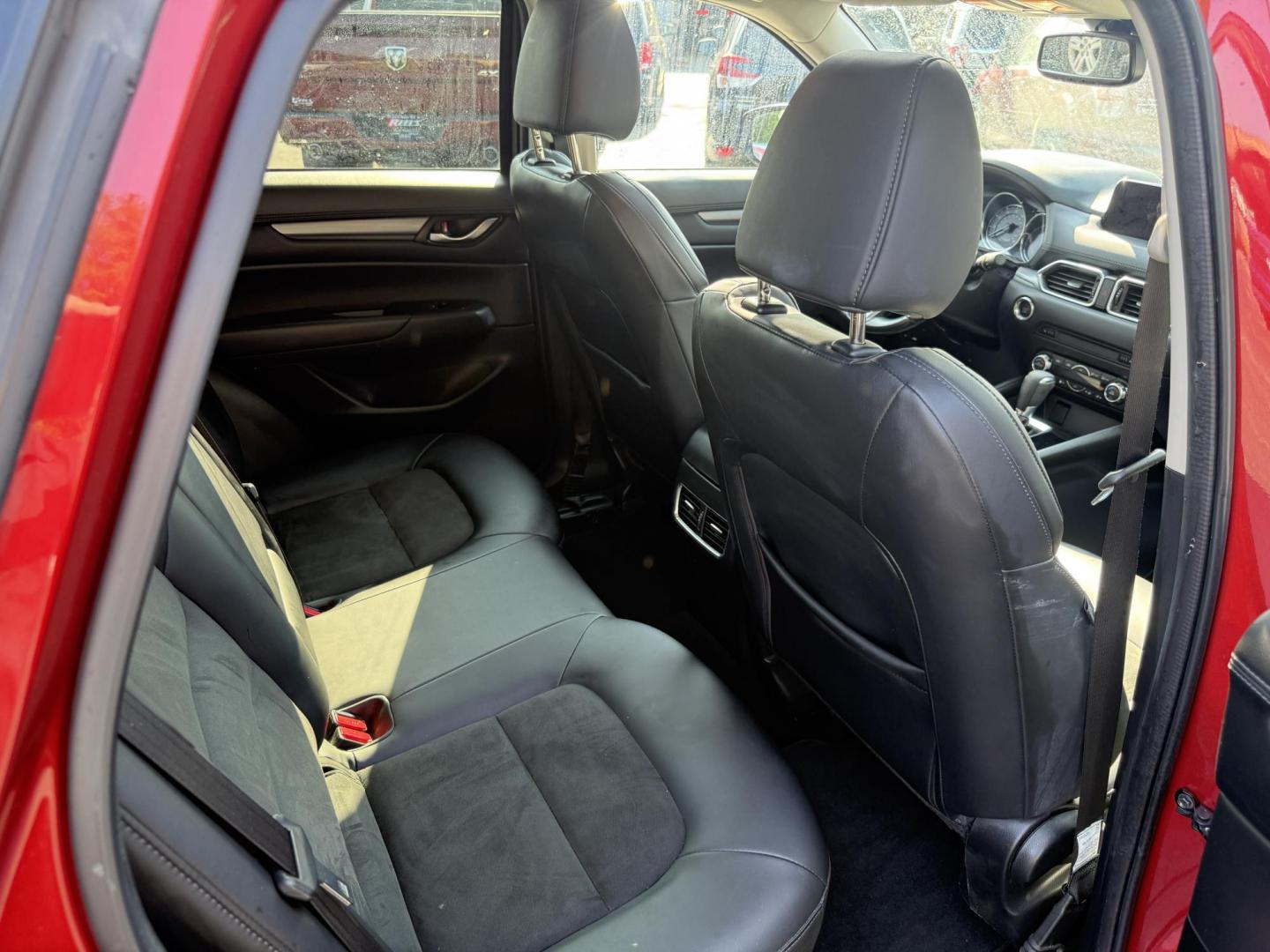 2018 Red /Black Mazda CX-5 Touring AWD (JM3KFBCM9J0) with an 2.5L I4 DOHC 16V engine, 6 Speed Automatic transmission, located at 547 E. Main St., Orwell, OH, 44076, (440) 437-5893, 41.535435, -80.847855 - This 2018 Mazda CX-5 Touring AWD with a 2.5L I4 engine and 6-speed automatic transmission offers a well-rounded package, delivering up to 30 MPG on the highway. It comes equipped with advanced safety features like Blind Spot Monitoring, Rear Cross Traffic Alert, and Adaptive Cruise Control, enhancin - Photo#32