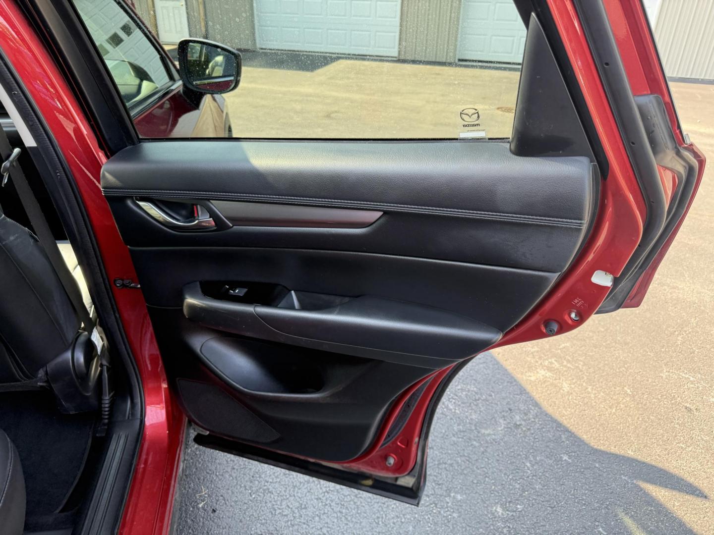 2018 Red /Black Mazda CX-5 Touring AWD (JM3KFBCM9J0) with an 2.5L I4 DOHC 16V engine, 6 Speed Automatic transmission, located at 547 E. Main St., Orwell, OH, 44076, (440) 437-5893, 41.535435, -80.847855 - This 2018 Mazda CX-5 Touring AWD with a 2.5L I4 engine and 6-speed automatic transmission offers a well-rounded package, delivering up to 30 MPG on the highway. It comes equipped with advanced safety features like Blind Spot Monitoring, Rear Cross Traffic Alert, and Adaptive Cruise Control, enhancin - Photo#33
