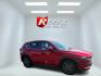 2018 Red /Black Mazda CX-5 Touring AWD (JM3KFBCM9J0) with an 2.5L I4 DOHC 16V engine, 6 Speed Automatic transmission, located at 547 E. Main St., Orwell, OH, 44076, (440) 437-5893, 41.535435, -80.847855 - This 2018 Mazda CX-5 Touring AWD with a 2.5L I4 engine and 6-speed automatic transmission offers a well-rounded package, delivering up to 30 MPG on the highway. It comes equipped with advanced safety features like Blind Spot Monitoring, Rear Cross Traffic Alert, and Adaptive Cruise Control, enhancin - Photo#39