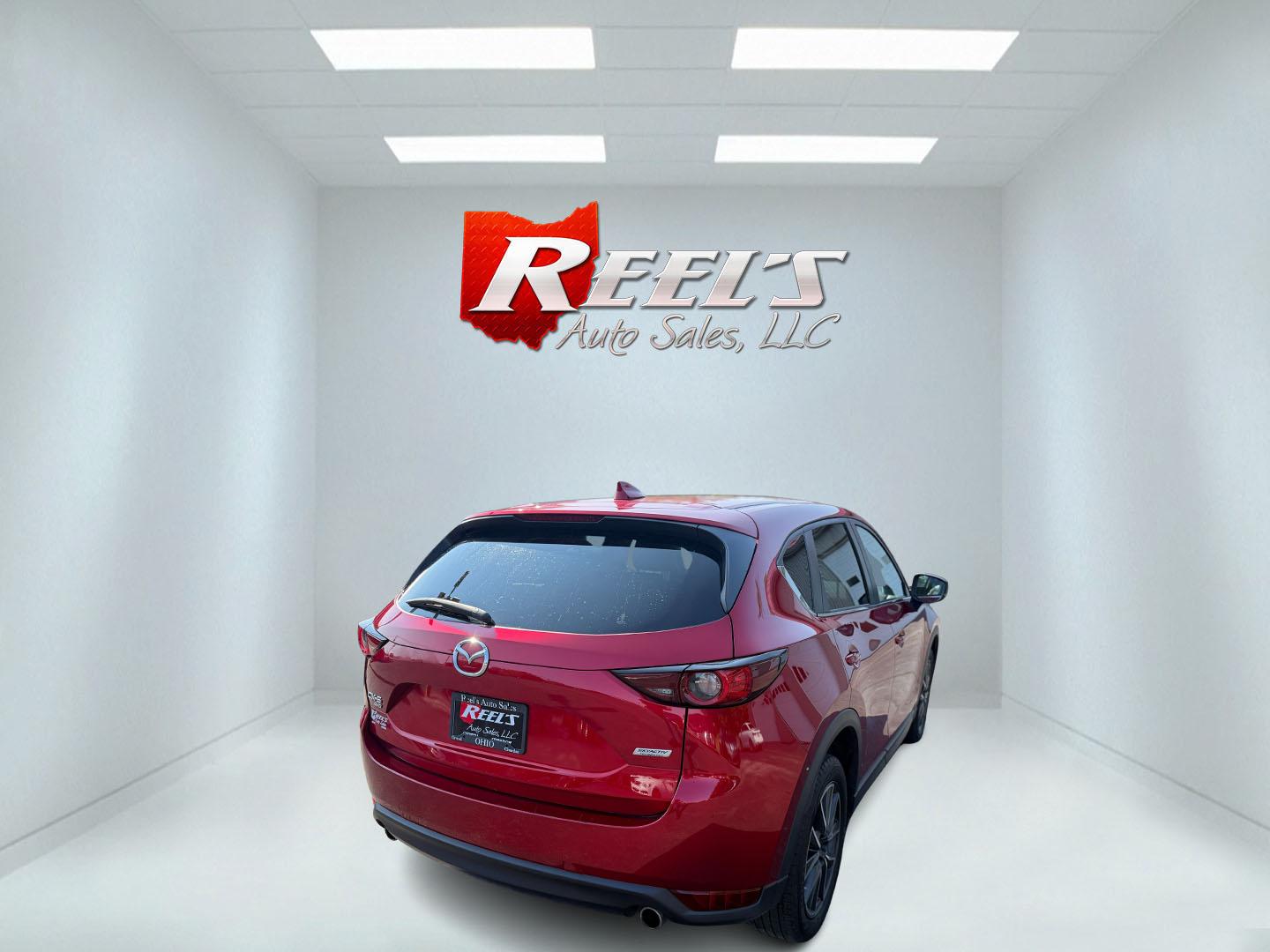 2018 Red /Black Mazda CX-5 Touring AWD (JM3KFBCM9J0) with an 2.5L I4 DOHC 16V engine, 6 Speed Automatic transmission, located at 547 E. Main St., Orwell, OH, 44076, (440) 437-5893, 41.535435, -80.847855 - This 2018 Mazda CX-5 Touring AWD with a 2.5L I4 engine and 6-speed automatic transmission offers a well-rounded package, delivering up to 30 MPG on the highway. It comes equipped with advanced safety features like Blind Spot Monitoring, Rear Cross Traffic Alert, and Adaptive Cruise Control, enhancin - Photo#41