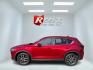 2018 Red /Black Mazda CX-5 Touring AWD (JM3KFBCM9J0) with an 2.5L I4 DOHC 16V engine, 6 Speed Automatic transmission, located at 547 E. Main St., Orwell, OH, 44076, (440) 437-5893, 41.535435, -80.847855 - This 2018 Mazda CX-5 Touring AWD with a 2.5L I4 engine and 6-speed automatic transmission offers a well-rounded package, delivering up to 30 MPG on the highway. It comes equipped with advanced safety features like Blind Spot Monitoring, Rear Cross Traffic Alert, and Adaptive Cruise Control, enhancin - Photo#45