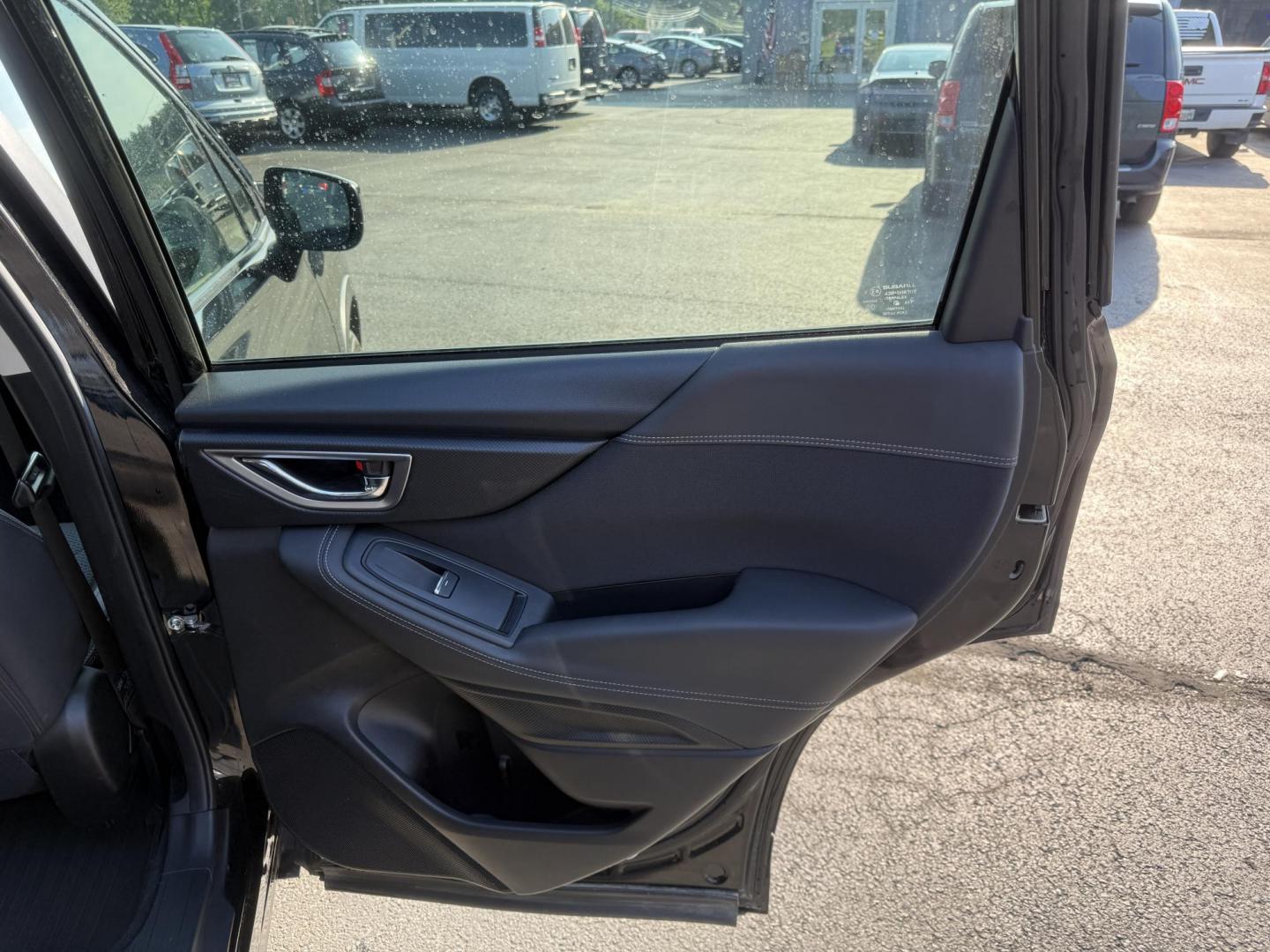 2020 Black /Black Subaru Forester 2.5i Premium (JF2SKAJC0LH) with an 2.5L H4 DOHC 16V engine, Automatic transmission, located at 547 E. Main St., Orwell, OH, 44076, (440) 437-5893, 41.535435, -80.847855 - This 2020 Subaru Forester 2.5i Premium features a 2.5L H4 engine paired with Subaru's renowned Symmetrical All-Wheel Drive, delivering confident traction and up to 33 MPG highway. Comfort amenities include a power driver's seat, heated front seats, single-zone automatic climate control, and a power - Photo#30