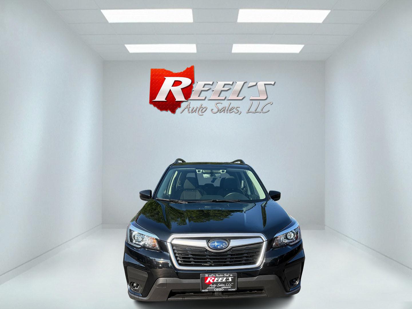 2020 Black /Black Subaru Forester 2.5i Premium (JF2SKAJC0LH) with an 2.5L H4 DOHC 16V engine, Automatic transmission, located at 547 E. Main St., Orwell, OH, 44076, (440) 437-5893, 41.535435, -80.847855 - This 2020 Subaru Forester 2.5i Premium features a 2.5L H4 engine paired with Subaru's renowned Symmetrical All-Wheel Drive, delivering confident traction and up to 33 MPG highway. Comfort amenities include a power driver's seat, heated front seats, single-zone automatic climate control, and a power - Photo#1