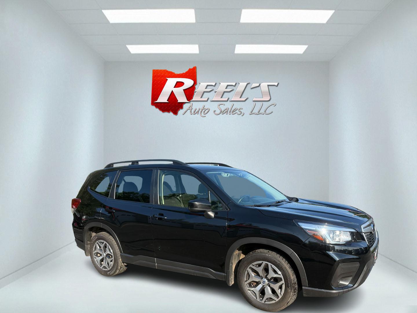 2020 Black /Black Subaru Forester 2.5i Premium (JF2SKAJC0LH) with an 2.5L H4 DOHC 16V engine, Automatic transmission, located at 547 E. Main St., Orwell, OH, 44076, (440) 437-5893, 41.535435, -80.847855 - This 2020 Subaru Forester 2.5i Premium features a 2.5L H4 engine paired with Subaru's renowned Symmetrical All-Wheel Drive, delivering confident traction and up to 33 MPG highway. Comfort amenities include a power driver's seat, heated front seats, single-zone automatic climate control, and a power - Photo#35