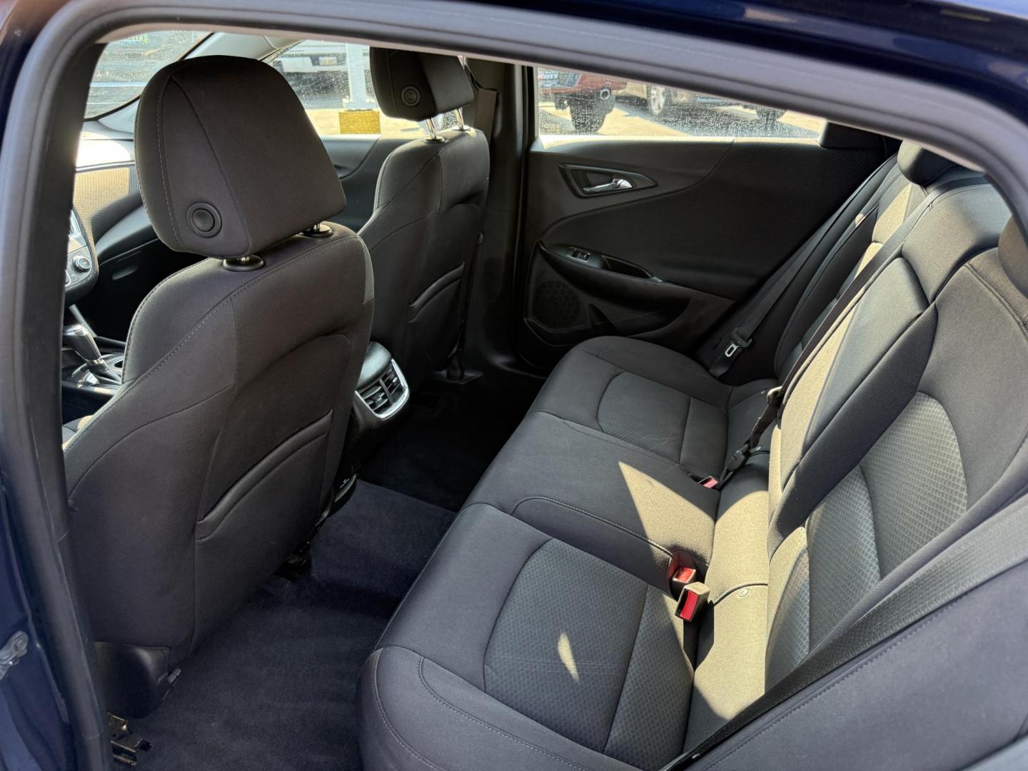 2017 Blue /Black Chevrolet Malibu 1LT (1G1ZE5ST3HF) with an 1.5L I4 DOHC 16V TURBO engine, 6-Speed Automatic transmission, located at 547 E. Main St., Orwell, OH, 44076, (440) 437-5893, 41.535435, -80.847855 - This 2017 Chevrolet Malibu LT features a turbocharged 1.5L EcoTec I4 engine paired with a 6-speed automatic transmission, delivering impressive fuel efficiency of up to 36 MPG on the highway. It comes equipped with daytime running lights, dusk-sensing headlights, a power driver’s seat, remote star - Photo#21
