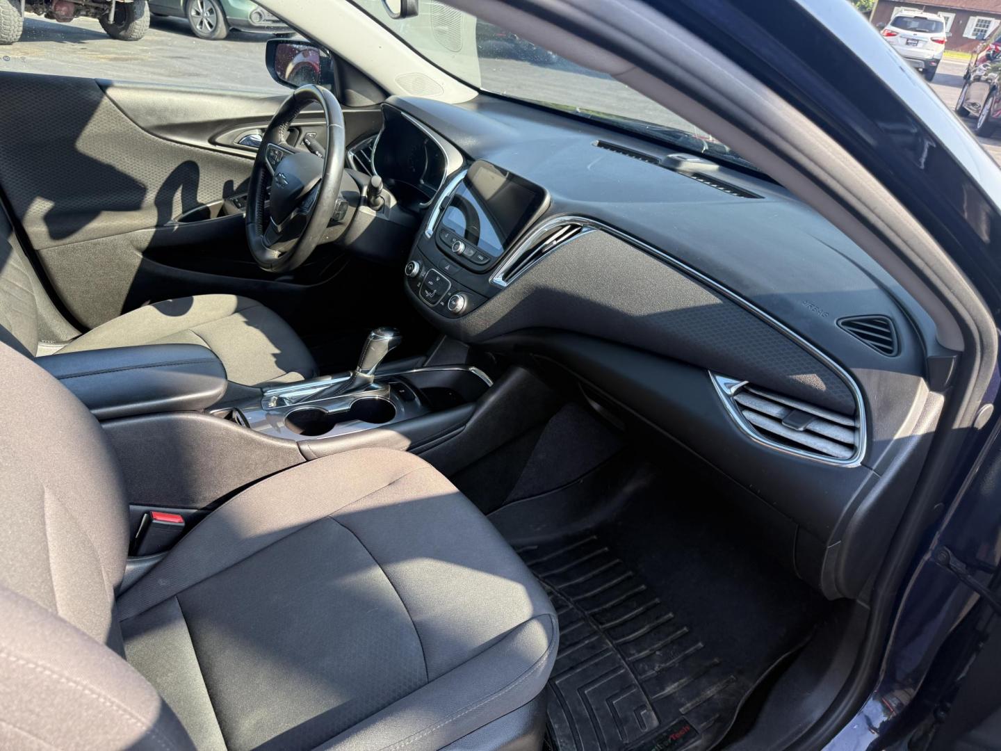 2017 Blue /Black Chevrolet Malibu 1LT (1G1ZE5ST3HF) with an 1.5L I4 DOHC 16V TURBO engine, 6-Speed Automatic transmission, located at 547 E. Main St., Orwell, OH, 44076, (440) 437-5893, 41.535435, -80.847855 - This 2017 Chevrolet Malibu LT features a turbocharged 1.5L EcoTec I4 engine paired with a 6-speed automatic transmission, delivering impressive fuel efficiency of up to 36 MPG on the highway. It comes equipped with daytime running lights, dusk-sensing headlights, a power driver’s seat, remote star - Photo#29