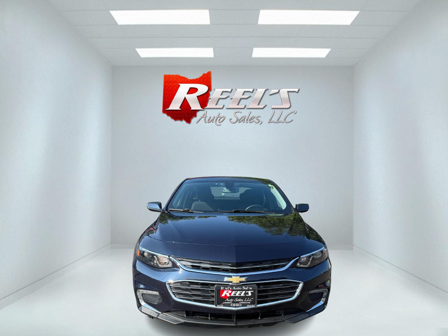 2017 Blue /Black Chevrolet Malibu 1LT (1G1ZE5ST3HF) with an 1.5L I4 DOHC 16V TURBO engine, 6-Speed Automatic transmission, located at 547 E. Main St., Orwell, OH, 44076, (440) 437-5893, 41.535435, -80.847855 - This 2017 Chevrolet Malibu LT features a turbocharged 1.5L EcoTec I4 engine paired with a 6-speed automatic transmission, delivering impressive fuel efficiency of up to 36 MPG on the highway. It comes equipped with daytime running lights, dusk-sensing headlights, a power driver’s seat, remote star - Photo#1