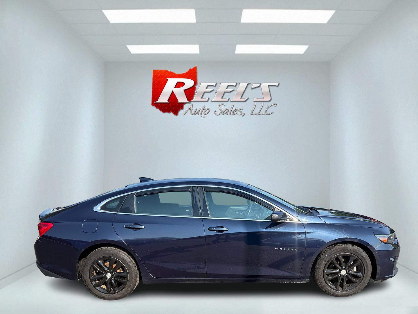 2017 Blue /Black Chevrolet Malibu 1LT (1G1ZE5ST3HF) with an 1.5L I4 DOHC 16V TURBO engine, 6-Speed Automatic transmission, located at 547 E. Main St., Orwell, OH, 44076, (440) 437-5893, 41.535435, -80.847855 - This 2017 Chevrolet Malibu LT features a turbocharged 1.5L EcoTec I4 engine paired with a 6-speed automatic transmission, delivering impressive fuel efficiency of up to 36 MPG on the highway. It comes equipped with daytime running lights, dusk-sensing headlights, a power driver’s seat, remote star - Photo#34