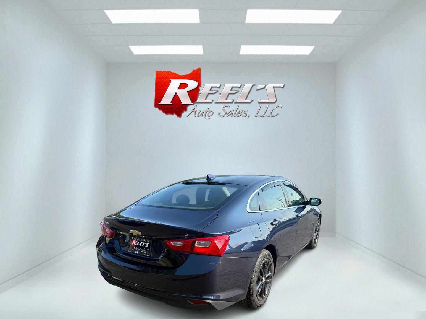 2017 Blue /Black Chevrolet Malibu 1LT (1G1ZE5ST3HF) with an 1.5L I4 DOHC 16V TURBO engine, 6-Speed Automatic transmission, located at 547 E. Main St., Orwell, OH, 44076, (440) 437-5893, 41.535435, -80.847855 - This 2017 Chevrolet Malibu LT features a turbocharged 1.5L EcoTec I4 engine paired with a 6-speed automatic transmission, delivering impressive fuel efficiency of up to 36 MPG on the highway. It comes equipped with daytime running lights, dusk-sensing headlights, a power driver’s seat, remote star - Photo#35