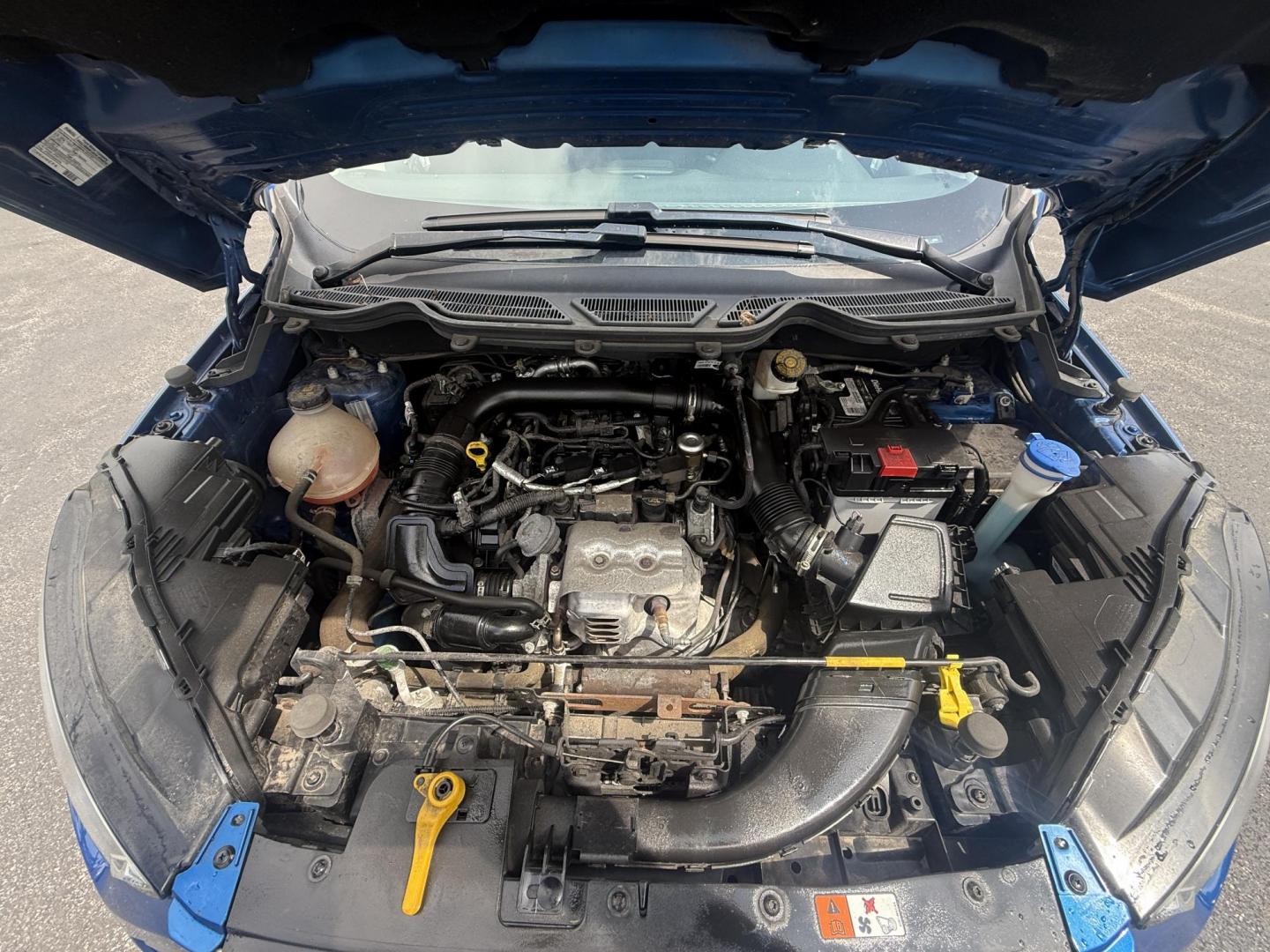 2018 Blue /Black Ford EcoSport SE (MAJ3P1TEXJC) with an 1.0L I3 Turbo engine, 6-Speed Automatic transmission, located at 11115 Chardon Rd. , Chardon, OH, 44024, (440) 214-9705, 41.580246, -81.241943 - This One Owner 2018 Ford EcoSport SE FWD is a compact SUV equipped with a 1.0-liter I3 turbocharged EcoBoost engine, paired with a 6-speed automatic transmission, offering an estimated 29 MPG on the highway. It features a range of convenient amenities including a power driver’s seat, single-zone a - Photo#3