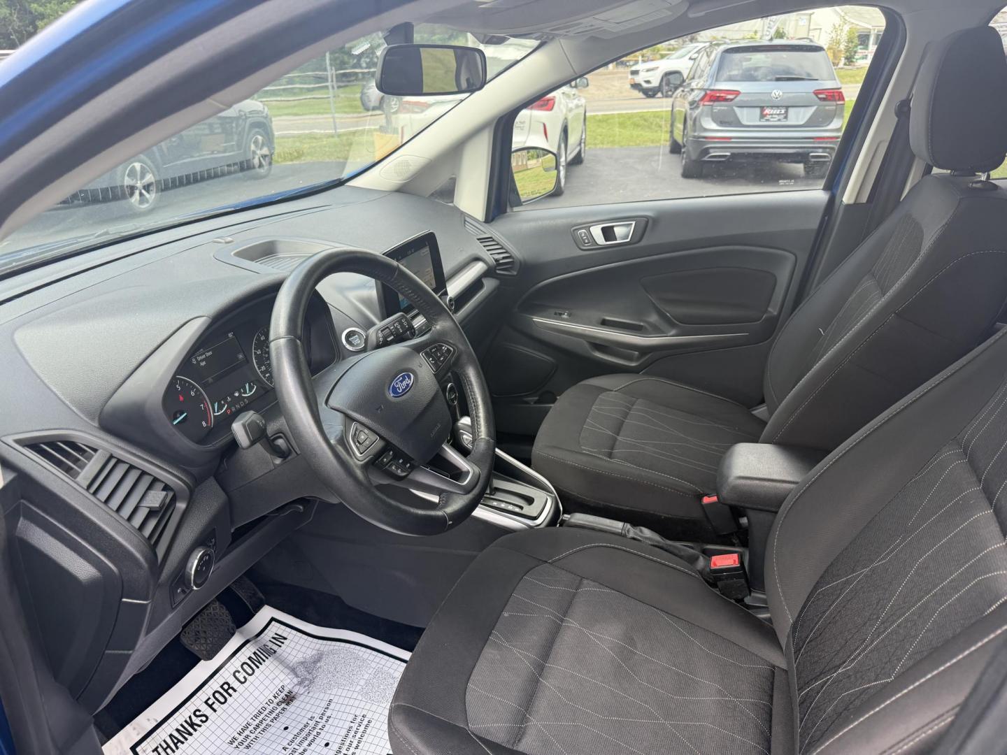 2018 Blue /Black Ford EcoSport SE (MAJ3P1TEXJC) with an 1.0L I3 Turbo engine, 6-Speed Automatic transmission, located at 11115 Chardon Rd. , Chardon, OH, 44024, (440) 214-9705, 41.580246, -81.241943 - This One Owner 2018 Ford EcoSport SE FWD is a compact SUV equipped with a 1.0-liter I3 turbocharged EcoBoost engine, paired with a 6-speed automatic transmission, offering an estimated 29 MPG on the highway. It features a range of convenient amenities including a power driver’s seat, single-zone a - Photo#8
