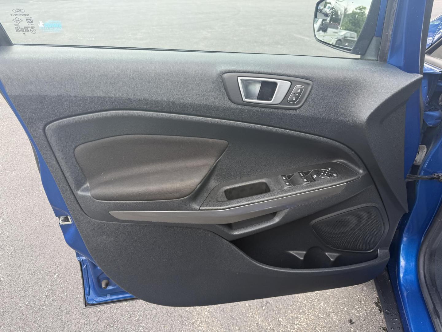 2018 Blue /Black Ford EcoSport SE (MAJ3P1TEXJC) with an 1.0L I3 Turbo engine, 6-Speed Automatic transmission, located at 11115 Chardon Rd. , Chardon, OH, 44024, (440) 214-9705, 41.580246, -81.241943 - This One Owner 2018 Ford EcoSport SE FWD is a compact SUV equipped with a 1.0-liter I3 turbocharged EcoBoost engine, paired with a 6-speed automatic transmission, offering an estimated 29 MPG on the highway. It features a range of convenient amenities including a power driver’s seat, single-zone a - Photo#9