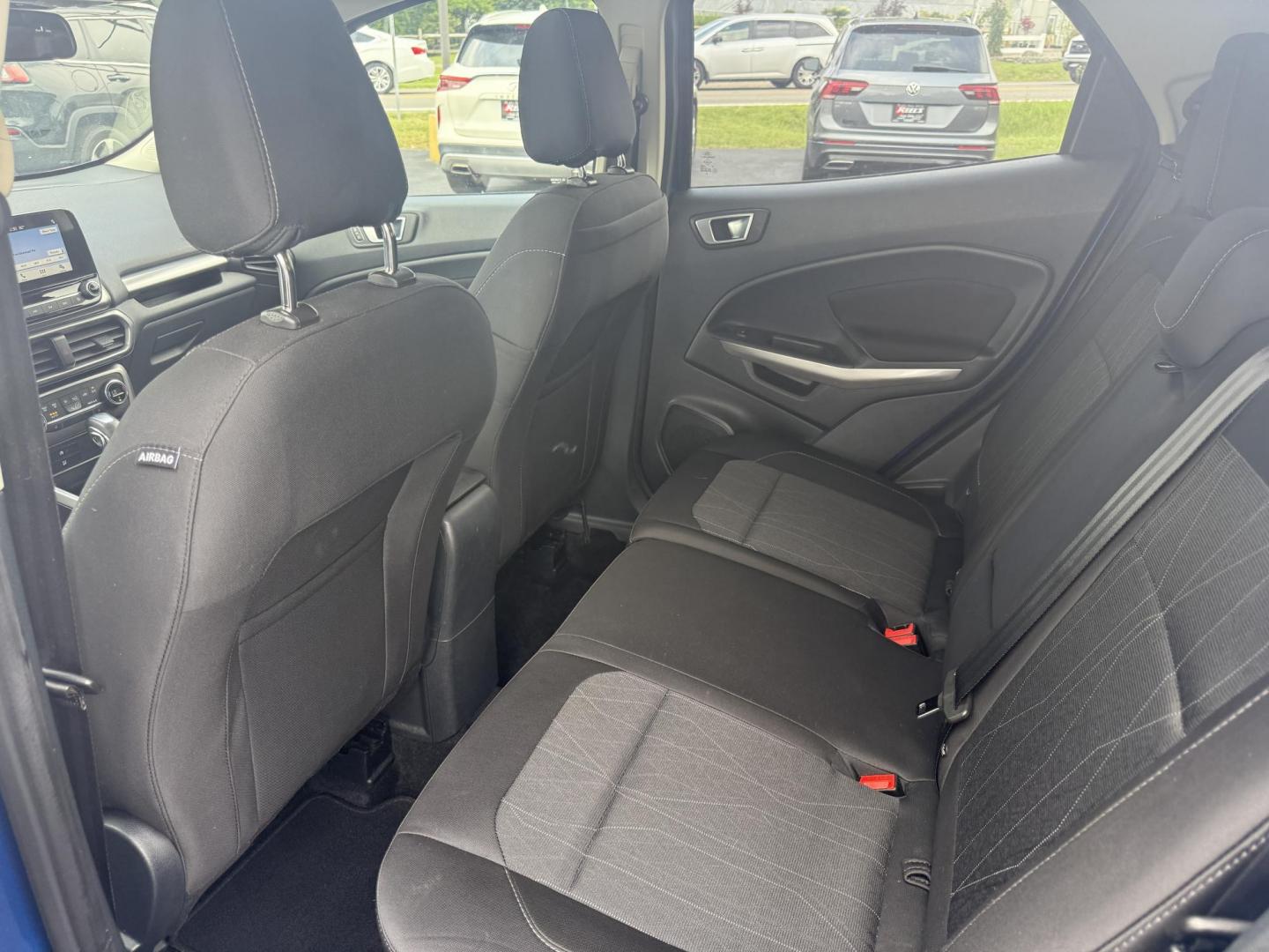 2018 Blue /Black Ford EcoSport SE (MAJ3P1TEXJC) with an 1.0L I3 Turbo engine, 6-Speed Automatic transmission, located at 11115 Chardon Rd. , Chardon, OH, 44024, (440) 214-9705, 41.580246, -81.241943 - This One Owner 2018 Ford EcoSport SE FWD is a compact SUV equipped with a 1.0-liter I3 turbocharged EcoBoost engine, paired with a 6-speed automatic transmission, offering an estimated 29 MPG on the highway. It features a range of convenient amenities including a power driver’s seat, single-zone a - Photo#23