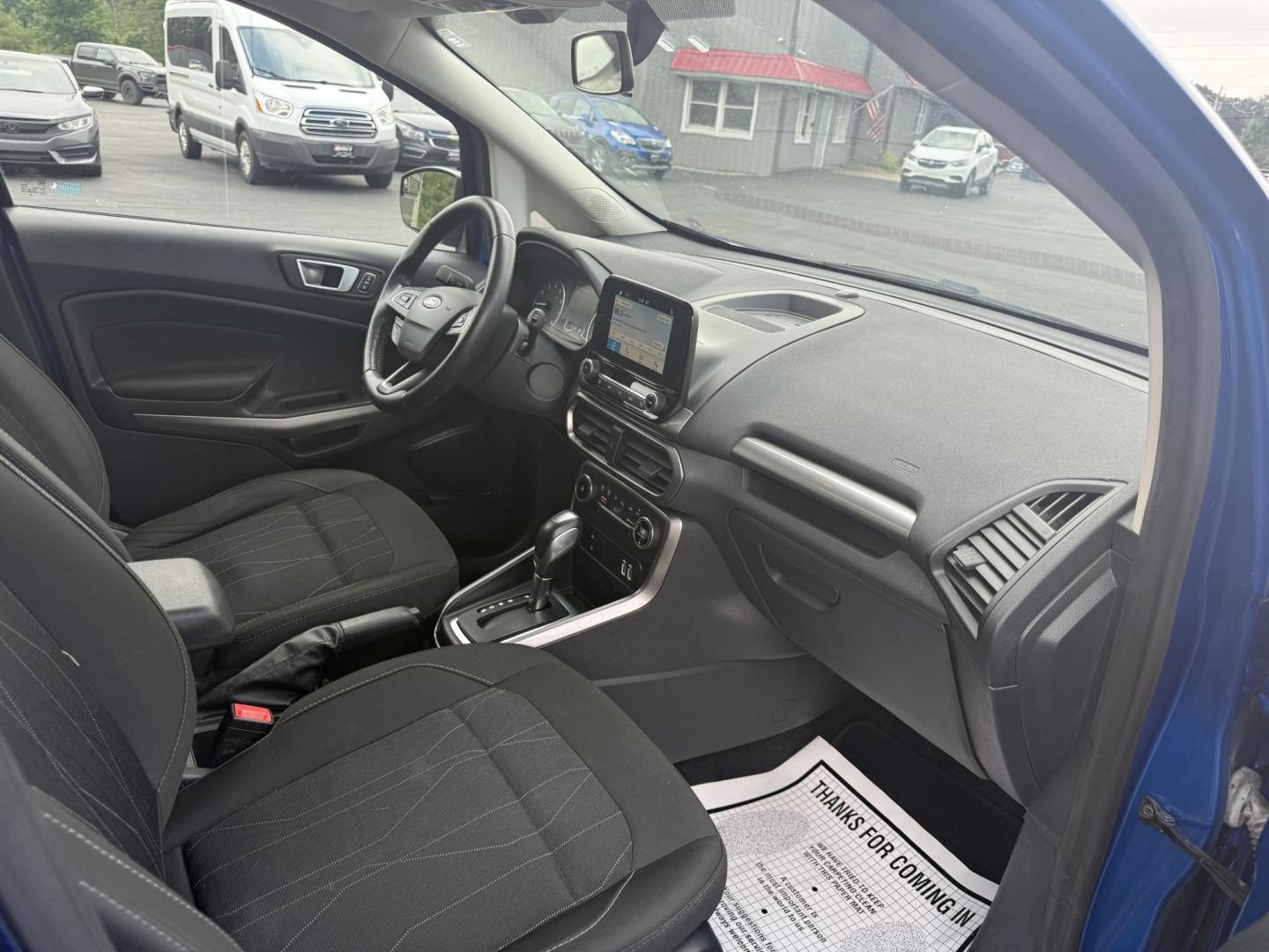 2018 Blue /Black Ford EcoSport SE (MAJ3P1TEXJC) with an 1.0L I3 Turbo engine, 6-Speed Automatic transmission, located at 11115 Chardon Rd. , Chardon, OH, 44024, (440) 214-9705, 41.580246, -81.241943 - This One Owner 2018 Ford EcoSport SE FWD is a compact SUV equipped with a 1.0-liter I3 turbocharged EcoBoost engine, paired with a 6-speed automatic transmission, offering an estimated 29 MPG on the highway. It features a range of convenient amenities including a power driver’s seat, single-zone a - Photo#30
