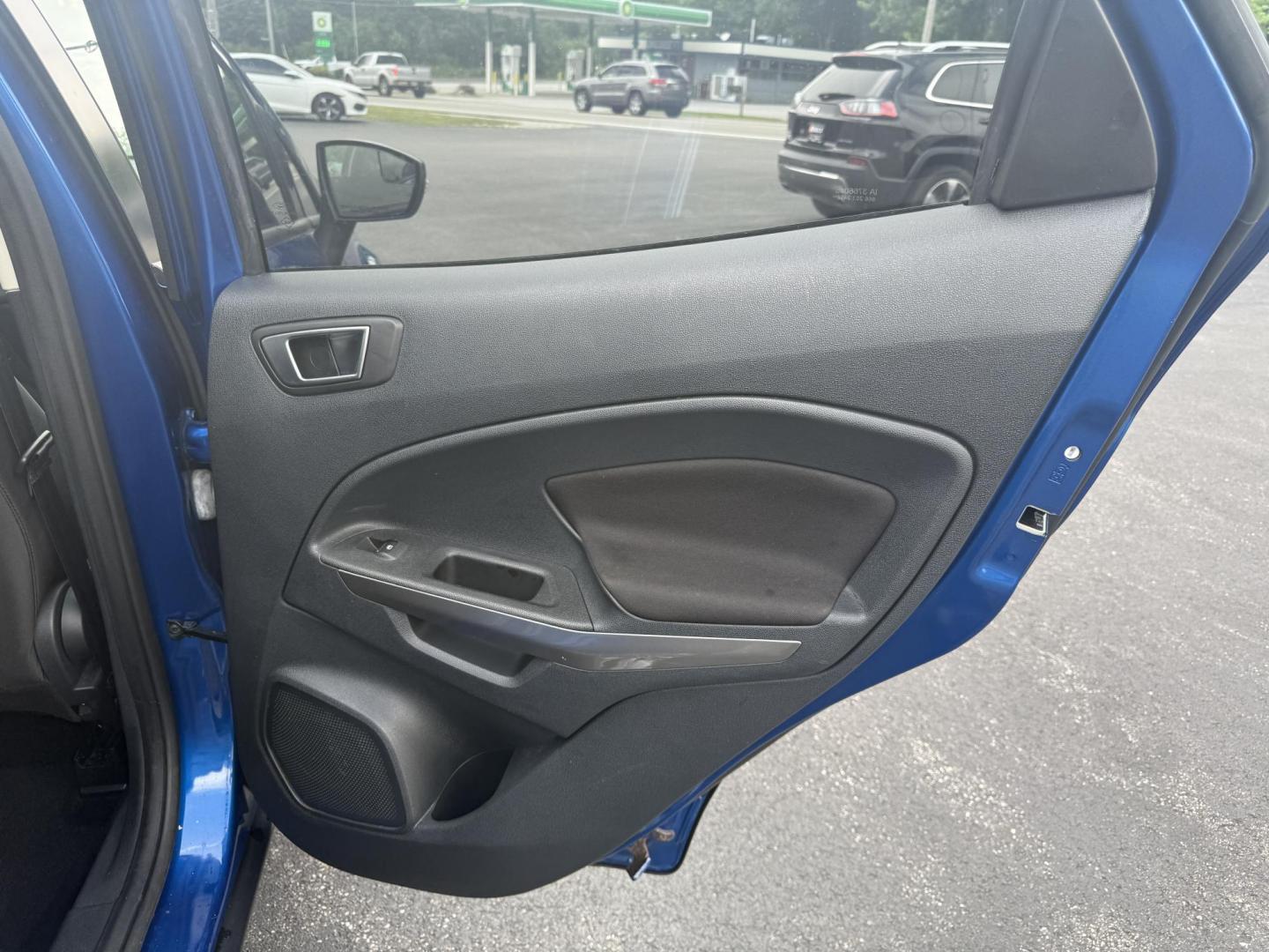 2018 Blue /Black Ford EcoSport SE (MAJ3P1TEXJC) with an 1.0L I3 Turbo engine, 6-Speed Automatic transmission, located at 11115 Chardon Rd. , Chardon, OH, 44024, (440) 214-9705, 41.580246, -81.241943 - This One Owner 2018 Ford EcoSport SE FWD is a compact SUV equipped with a 1.0-liter I3 turbocharged EcoBoost engine, paired with a 6-speed automatic transmission, offering an estimated 29 MPG on the highway. It features a range of convenient amenities including a power driver’s seat, single-zone a - Photo#29