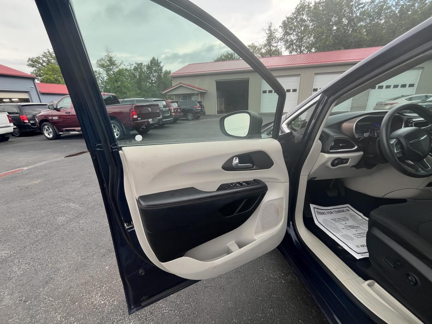 2017 Blue /Black Chrysler Pacifica Touring (2C4RC1DG8HR) with an 3.6L V6 DOHC 24V engine, 9A transmission, located at 547 E. Main St., Orwell, OH, 44076, (440) 437-5893, 41.535435, -80.847855 - This 2017 Chrysler Pacifica Touring is a versatile minivan powered by a 3.6-liter Pentastar V6 engine paired with a 9-speed automatic transmission, offering an impressive 28 MPG on the highway. It features a range of convenient amenities including a power driver’s seat, power liftgate, an 8.4-inch - Photo#3
