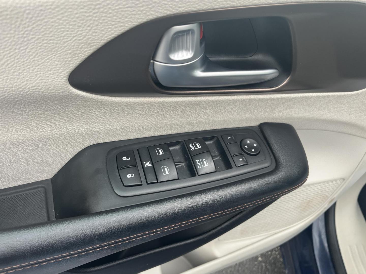 2017 Blue /Black Chrysler Pacifica Touring (2C4RC1DG8HR) with an 3.6L V6 DOHC 24V engine, 9A transmission, located at 547 E. Main St., Orwell, OH, 44076, (440) 437-5893, 41.535435, -80.847855 - This 2017 Chrysler Pacifica Touring is a versatile minivan powered by a 3.6-liter Pentastar V6 engine paired with a 9-speed automatic transmission, offering an impressive 28 MPG on the highway. It features a range of convenient amenities including a power driver’s seat, power liftgate, an 8.4-inch - Photo#4