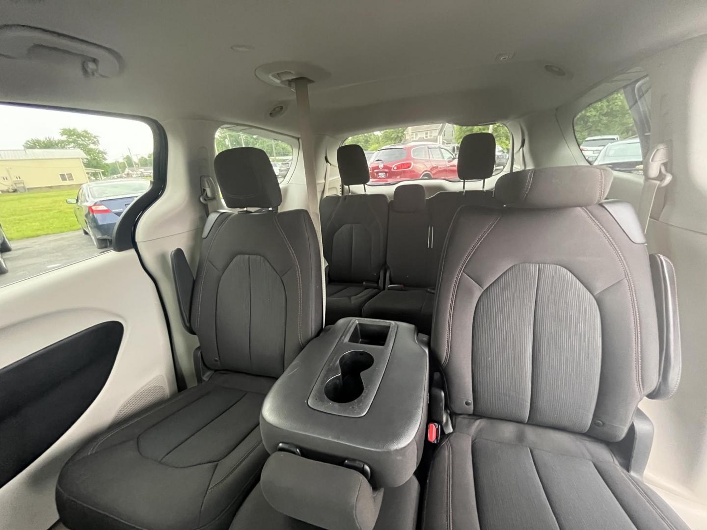 2017 Blue /Black Chrysler Pacifica Touring (2C4RC1DG8HR) with an 3.6L V6 DOHC 24V engine, 9A transmission, located at 547 E. Main St., Orwell, OH, 44076, (440) 437-5893, 41.535435, -80.847855 - This 2017 Chrysler Pacifica Touring is a versatile minivan powered by a 3.6-liter Pentastar V6 engine paired with a 9-speed automatic transmission, offering an impressive 28 MPG on the highway. It features a range of convenient amenities including a power driver’s seat, power liftgate, an 8.4-inch - Photo#16