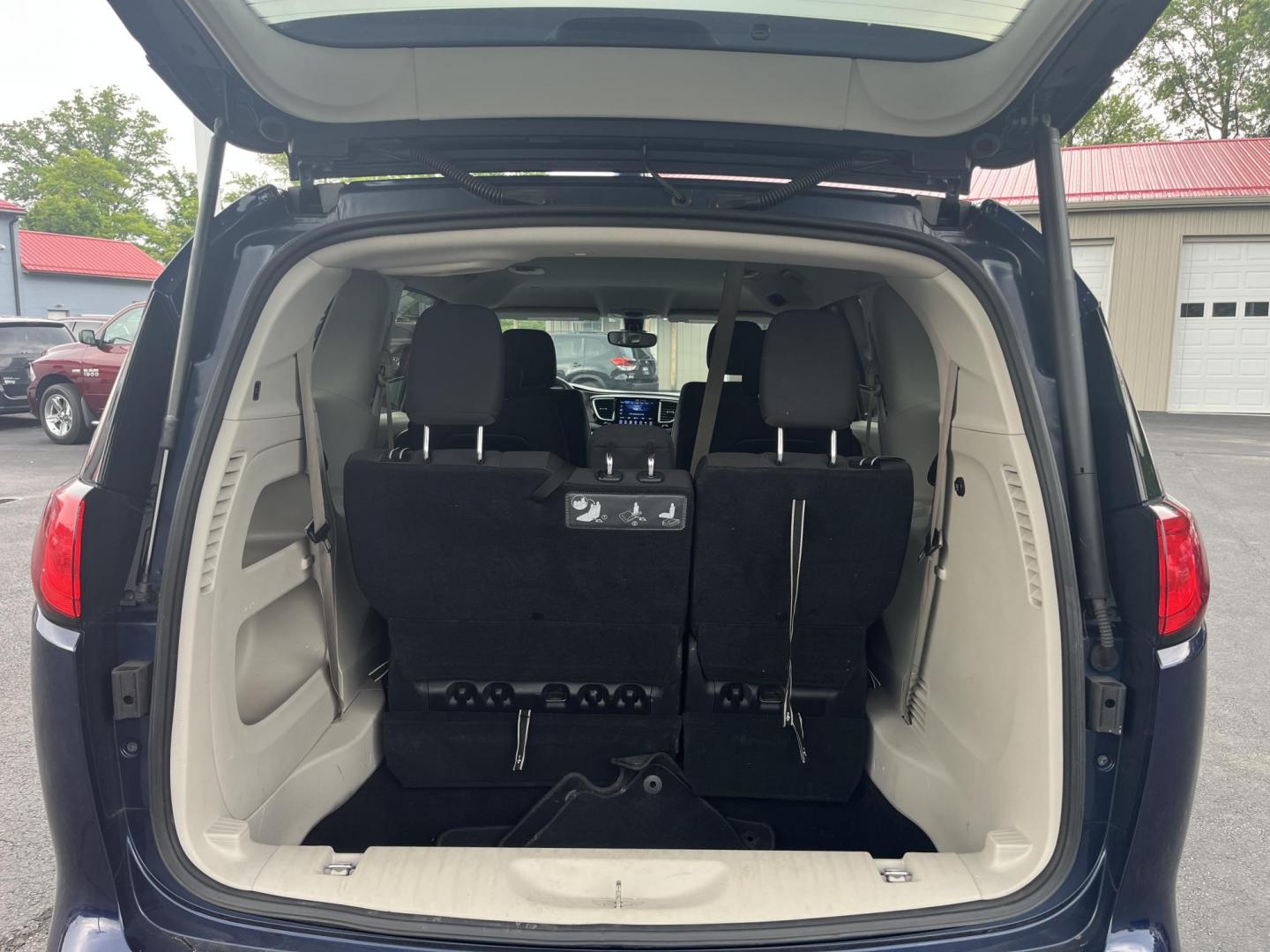 2017 Blue /Black Chrysler Pacifica Touring (2C4RC1DG8HR) with an 3.6L V6 DOHC 24V engine, 9A transmission, located at 547 E. Main St., Orwell, OH, 44076, (440) 437-5893, 41.535435, -80.847855 - This 2017 Chrysler Pacifica Touring is a versatile minivan powered by a 3.6-liter Pentastar V6 engine paired with a 9-speed automatic transmission, offering an impressive 28 MPG on the highway. It features a range of convenient amenities including a power driver’s seat, power liftgate, an 8.4-inch - Photo#19