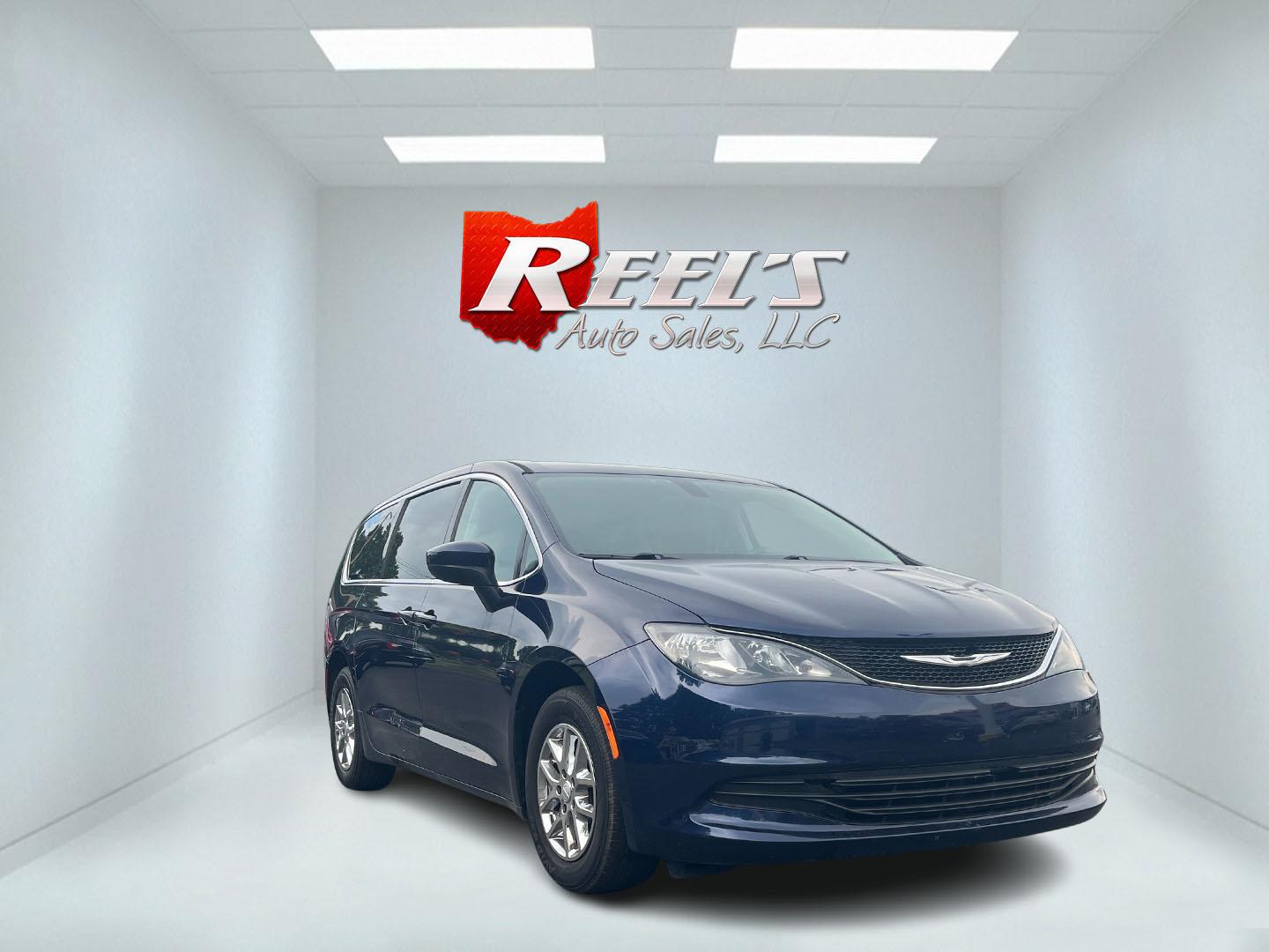 2017 Blue /Black Chrysler Pacifica Touring (2C4RC1DG8HR) with an 3.6L V6 DOHC 24V engine, 9A transmission, located at 547 E. Main St., Orwell, OH, 44076, (440) 437-5893, 41.535435, -80.847855 - This 2017 Chrysler Pacifica Touring is a versatile minivan powered by a 3.6-liter Pentastar V6 engine paired with a 9-speed automatic transmission, offering an impressive 28 MPG on the highway. It features a range of convenient amenities including a power driver’s seat, power liftgate, an 8.4-inch - Photo#2