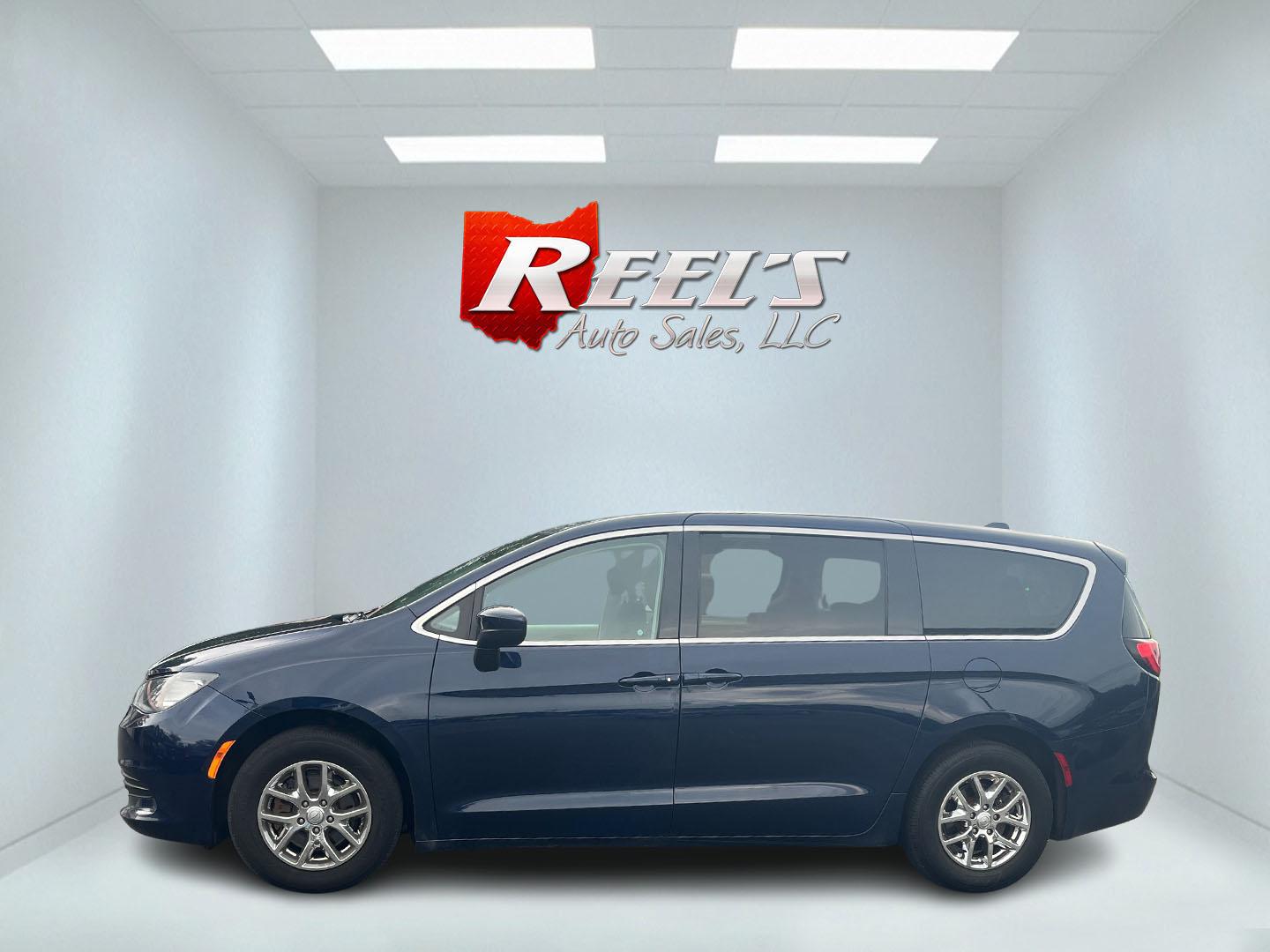 2017 Blue /Black Chrysler Pacifica Touring (2C4RC1DG8HR) with an 3.6L V6 DOHC 24V engine, 9A transmission, located at 547 E. Main St., Orwell, OH, 44076, (440) 437-5893, 41.535435, -80.847855 - This 2017 Chrysler Pacifica Touring is a versatile minivan powered by a 3.6-liter Pentastar V6 engine paired with a 9-speed automatic transmission, offering an impressive 28 MPG on the highway. It features a range of convenient amenities including a power driver’s seat, power liftgate, an 8.4-inch - Photo#31