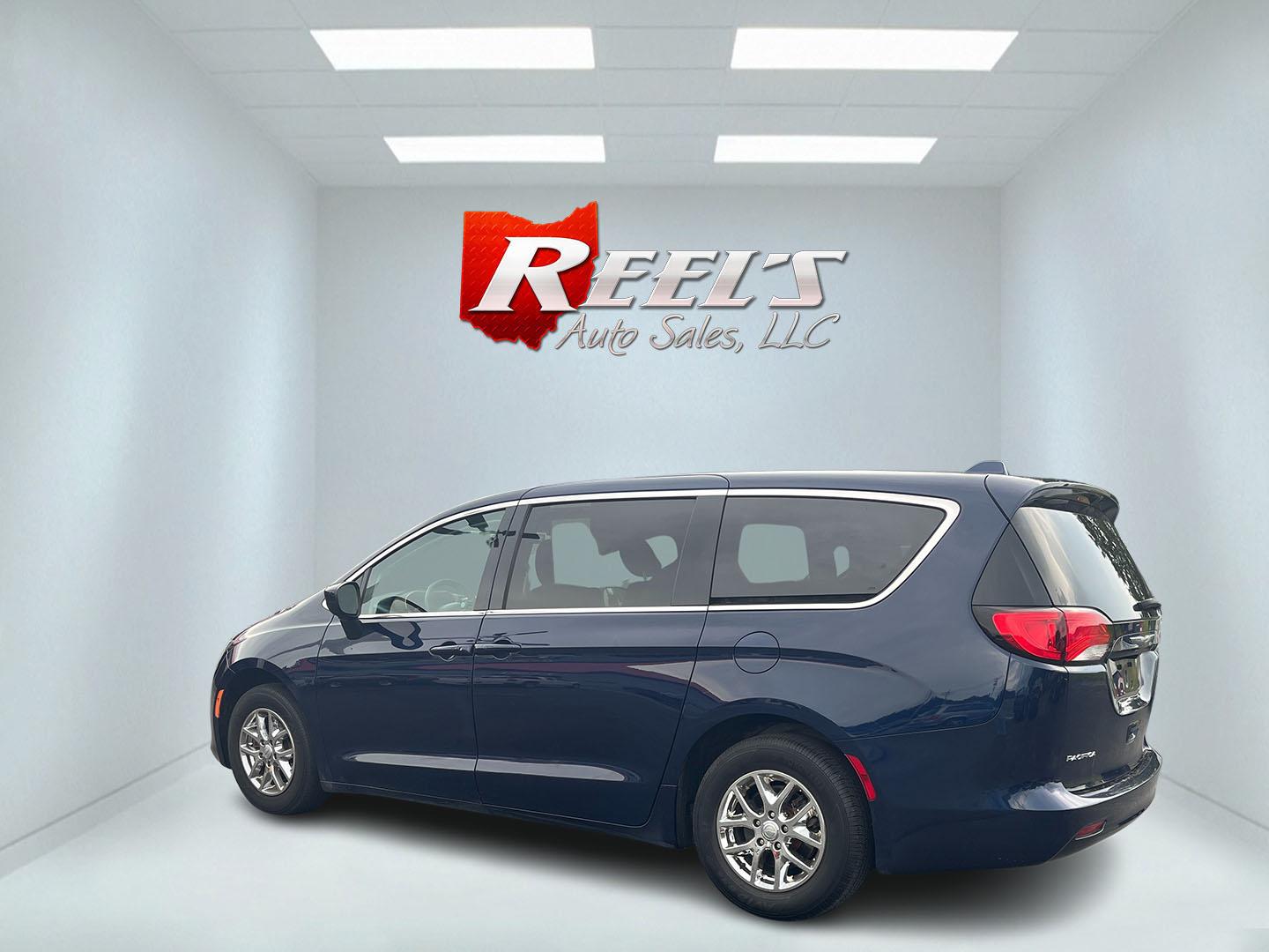 2017 Blue /Black Chrysler Pacifica Touring (2C4RC1DG8HR) with an 3.6L V6 DOHC 24V engine, 9A transmission, located at 547 E. Main St., Orwell, OH, 44076, (440) 437-5893, 41.535435, -80.847855 - This 2017 Chrysler Pacifica Touring is a versatile minivan powered by a 3.6-liter Pentastar V6 engine paired with a 9-speed automatic transmission, offering an impressive 28 MPG on the highway. It features a range of convenient amenities including a power driver’s seat, power liftgate, an 8.4-inch - Photo#32
