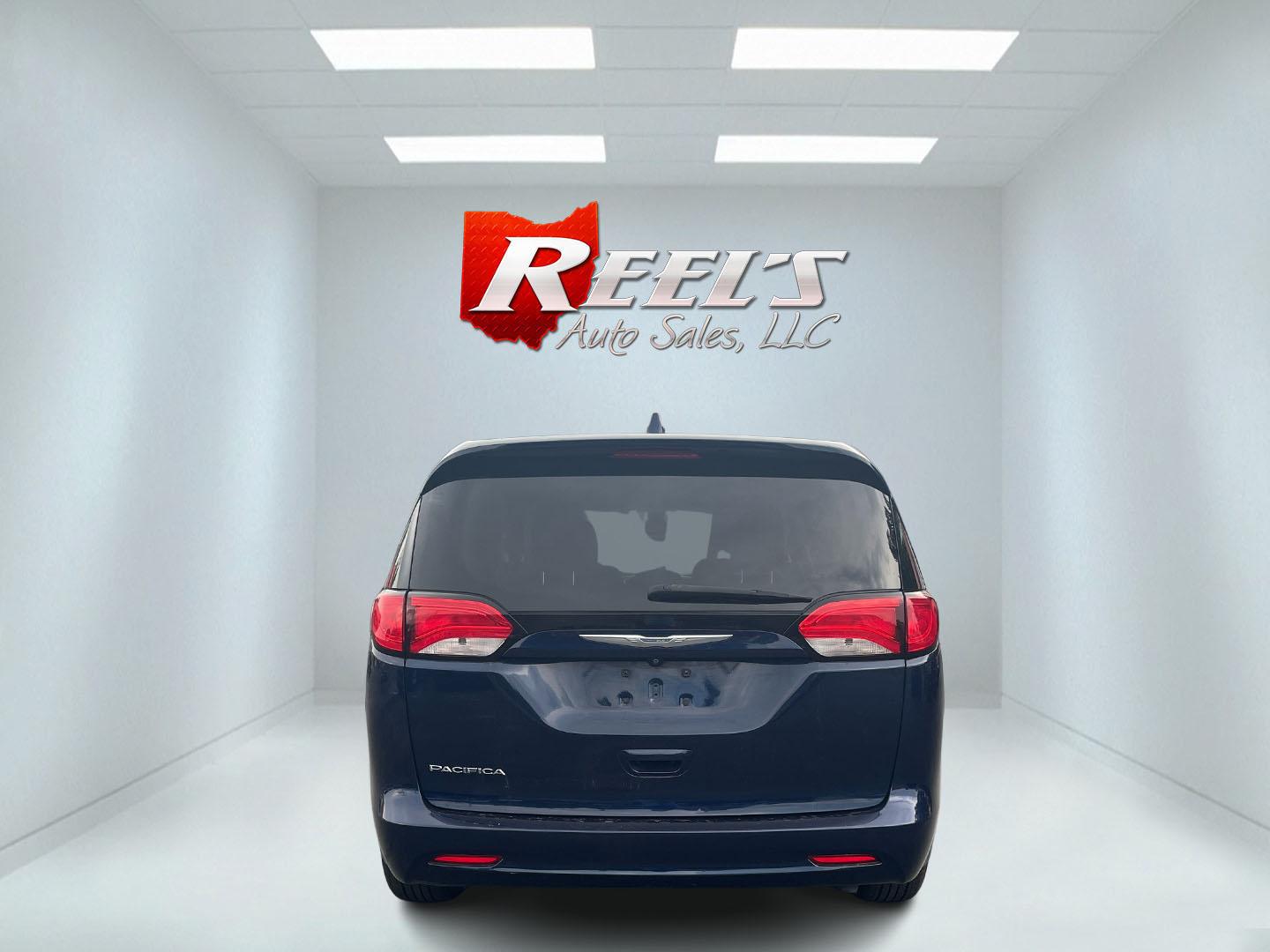 2017 Blue /Black Chrysler Pacifica Touring (2C4RC1DG8HR) with an 3.6L V6 DOHC 24V engine, 9A transmission, located at 547 E. Main St., Orwell, OH, 44076, (440) 437-5893, 41.535435, -80.847855 - This 2017 Chrysler Pacifica Touring is a versatile minivan powered by a 3.6-liter Pentastar V6 engine paired with a 9-speed automatic transmission, offering an impressive 28 MPG on the highway. It features a range of convenient amenities including a power driver’s seat, power liftgate, an 8.4-inch - Photo#34