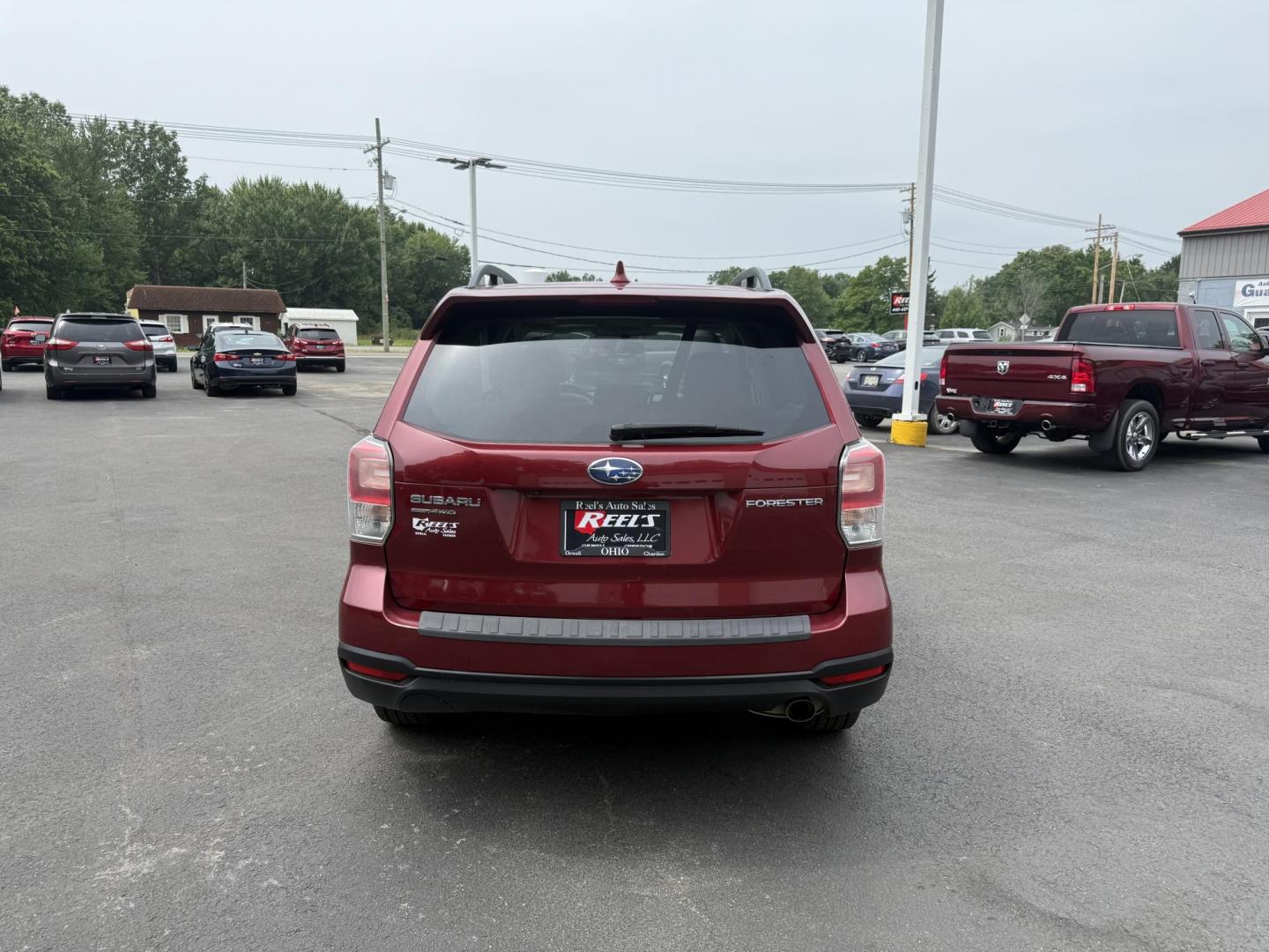 2018 Red /Gray Subaru Forester 2.5i Limited (JF2SJAJC5JH) with an 2.5L H4 DOHC 16V engine, Automatic transmission, located at 547 E. Main St., Orwell, OH, 44076, (440) 437-5893, 41.535435, -80.847855 - This 2018 Subaru Forester 2.5i Limited is a well-equipped compact SUV featuring a 2.5L H4 engine, leather interior, power driver's seat, heated front seats, and a 7.0" touchscreen infotainment system with a backup camera. It offers convenience and safety features like a power liftgate, blind spot mo - Photo#8