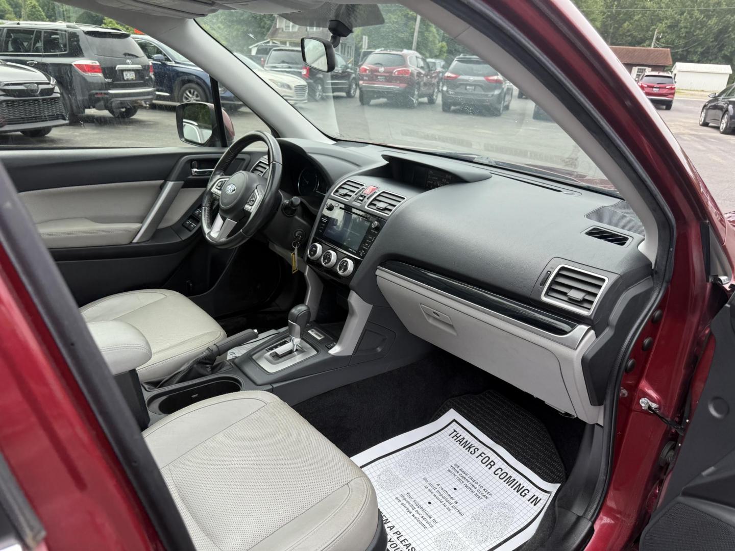 2018 Red /Gray Subaru Forester 2.5i Limited (JF2SJAJC5JH) with an 2.5L H4 DOHC 16V engine, Automatic transmission, located at 547 E. Main St., Orwell, OH, 44076, (440) 437-5893, 41.535435, -80.847855 - This 2018 Subaru Forester 2.5i Limited is a well-equipped compact SUV featuring a 2.5L H4 engine, leather interior, power driver's seat, heated front seats, and a 7.0" touchscreen infotainment system with a backup camera. It offers convenience and safety features like a power liftgate, blind spot mo - Photo#37