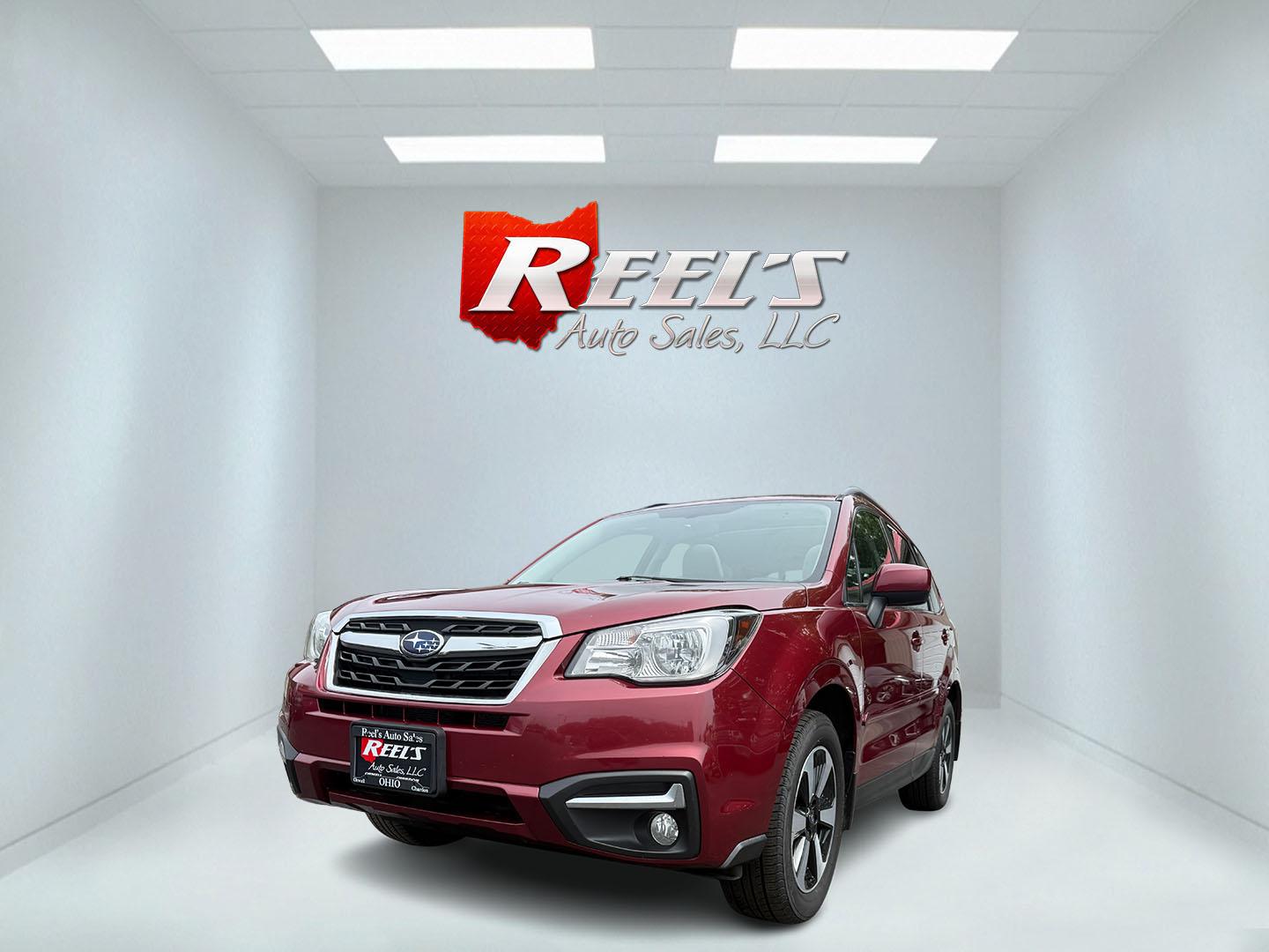 2018 Red /Gray Subaru Forester 2.5i Limited (JF2SJAJC5JH) with an 2.5L H4 DOHC 16V engine, Automatic transmission, located at 547 E. Main St., Orwell, OH, 44076, (440) 437-5893, 41.535435, -80.847855 - This 2018 Subaru Forester 2.5i Limited is a well-equipped compact SUV featuring a 2.5L H4 engine, leather interior, power driver's seat, heated front seats, and a 7.0" touchscreen infotainment system with a backup camera. It offers convenience and safety features like a power liftgate, blind spot mo - Photo#0