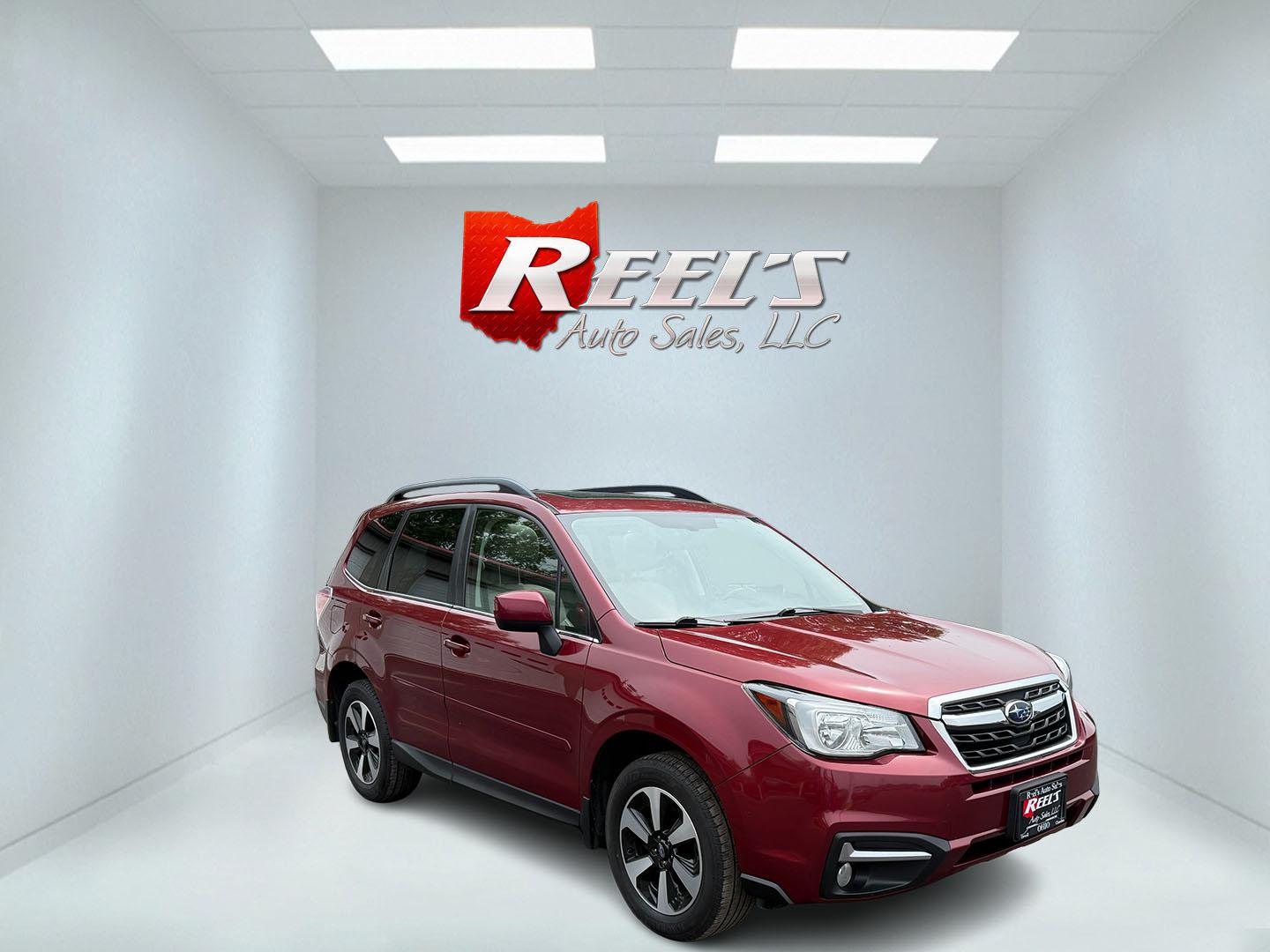 2018 Red /Gray Subaru Forester 2.5i Limited (JF2SJAJC5JH) with an 2.5L H4 DOHC 16V engine, Automatic transmission, located at 547 E. Main St., Orwell, OH, 44076, (440) 437-5893, 41.535435, -80.847855 - This 2018 Subaru Forester 2.5i Limited is a well-equipped compact SUV featuring a 2.5L H4 engine, leather interior, power driver's seat, heated front seats, and a 7.0" touchscreen infotainment system with a backup camera. It offers convenience and safety features like a power liftgate, blind spot mo - Photo#2
