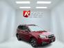 2018 Red /Gray Subaru Forester 2.5i Limited (JF2SJAJC5JH) with an 2.5L H4 DOHC 16V engine, Automatic transmission, located at 547 E. Main St., Orwell, OH, 44076, (440) 437-5893, 41.535435, -80.847855 - This 2018 Subaru Forester 2.5i Limited is a well-equipped compact SUV featuring a 2.5L H4 engine, leather interior, power driver's seat, heated front seats, and a 7.0" touchscreen infotainment system with a backup camera. It offers convenience and safety features like a power liftgate, blind spot mo - Photo#2